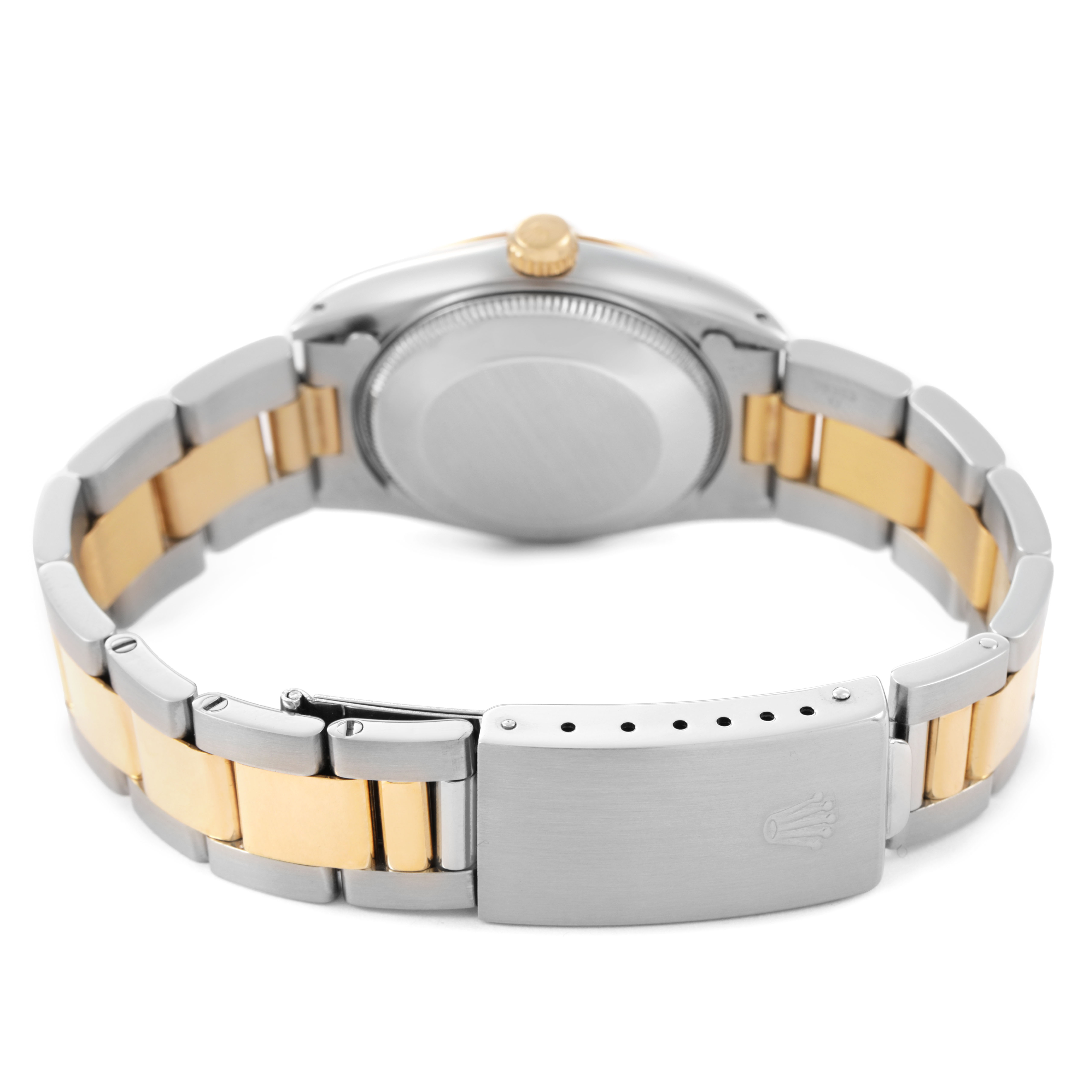 The Rolex Datejust 68273 Women's Steel and Gold (two tone) Beige Dial watch is shown from the back, highlighting the case back and two-tone bracelet with clasp.
