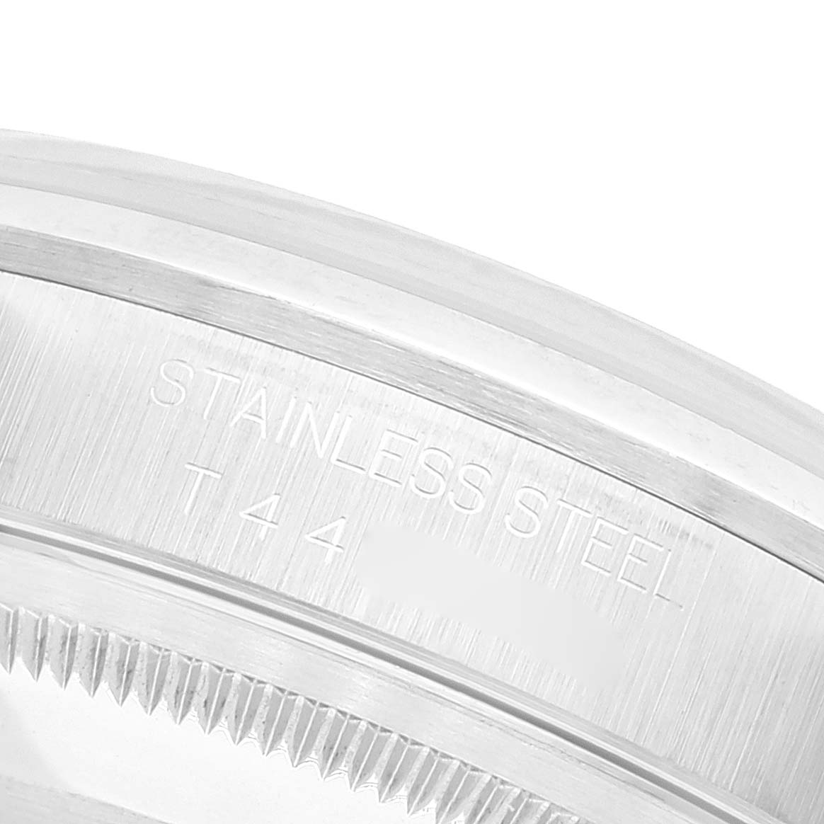 This close-up image shows the stainless steel case back and marking of a Rolex Datejust 16200 Men's Stainless Steel Blue Dial 16200 Men's Stainless Steel Blue Dial watch.