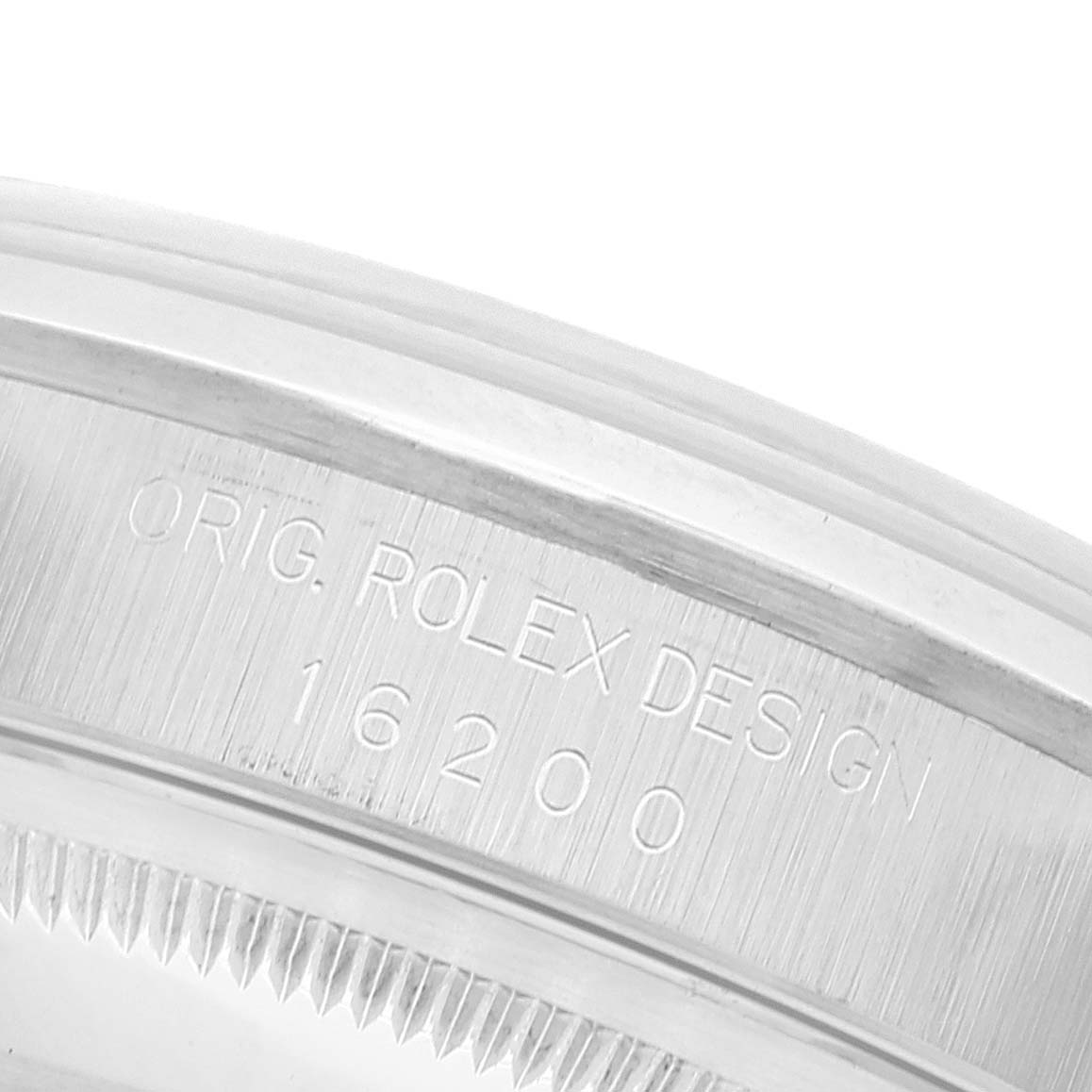 The image shows a close-up view of the case side of a Rolex Datejust 16200 Men's Stainless Steel Blue Dial 16200 Men's Stainless Steel Blue Dial model with the reference number 16200 engraved.