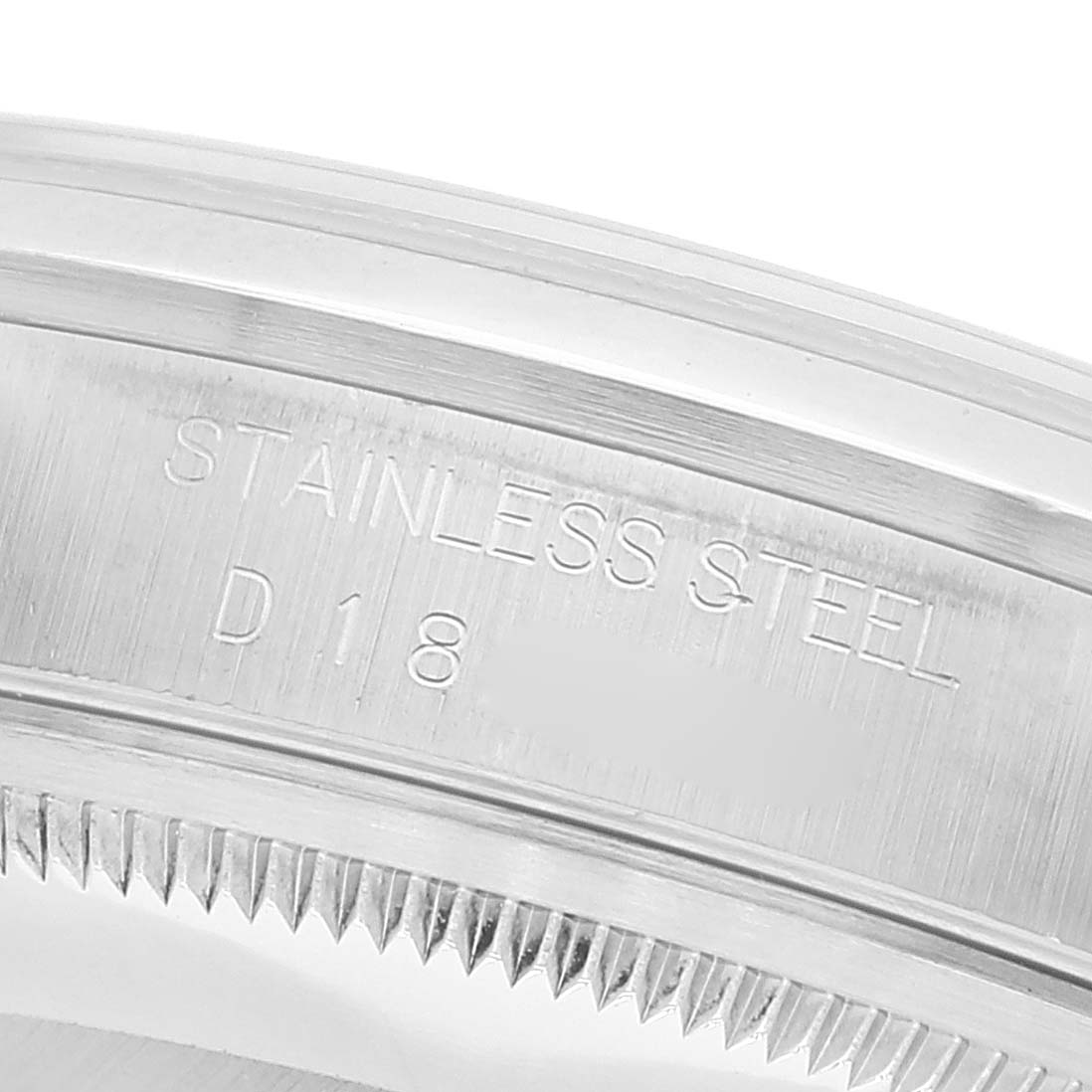 The image shows a close-up of the stainless steel case back of a Rolex Datejust 16200 Men's Stainless Steel Silver Dial 16200 Men's Stainless Steel Silver Dial watch, highlighting the engraved text.