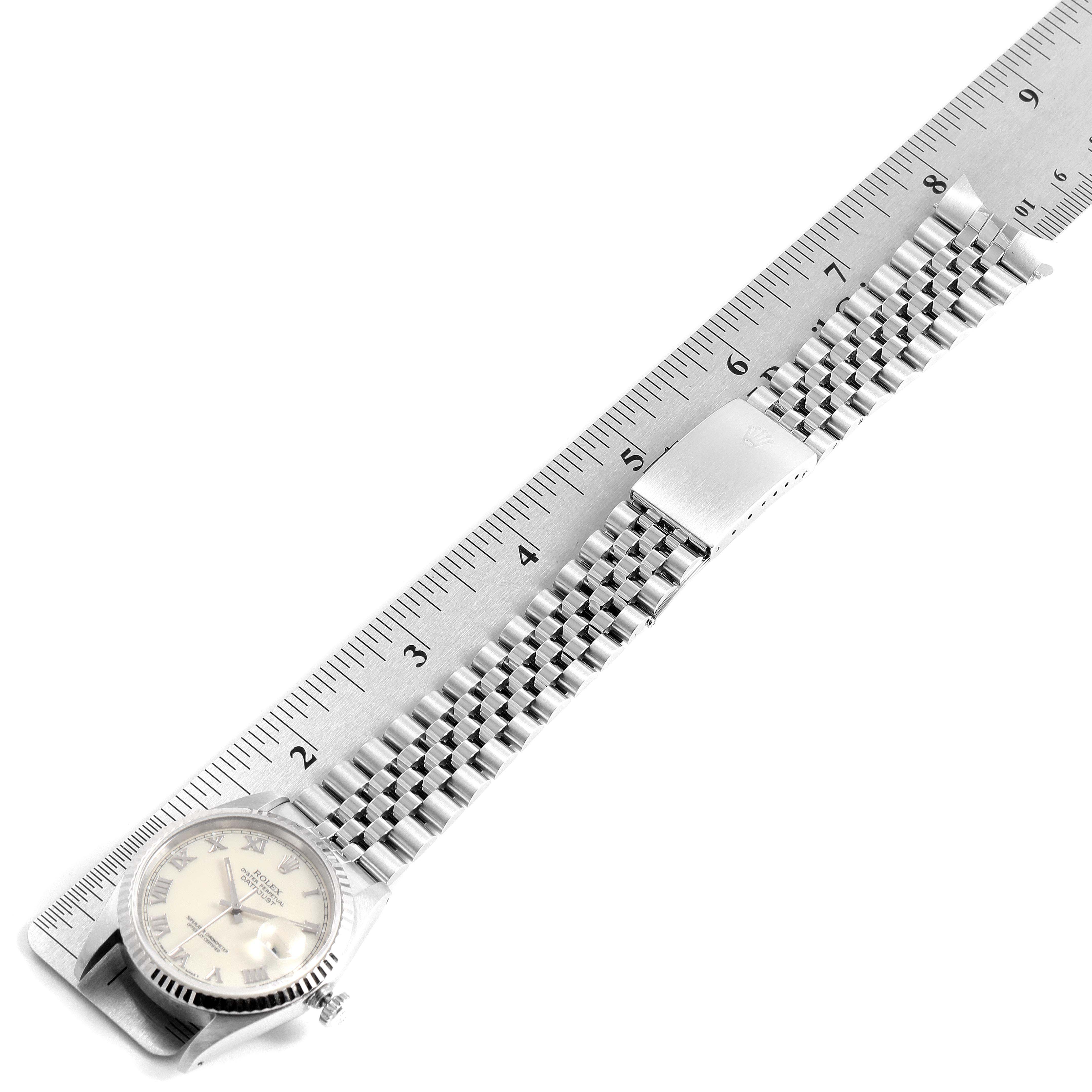 The image shows a Rolex Datejust 16234 Men's Stainless Steel Beige Dial 16234 Men's Stainless Steel Beige Dial watch laid flat with its bracelet fully extended alongside a ruler.