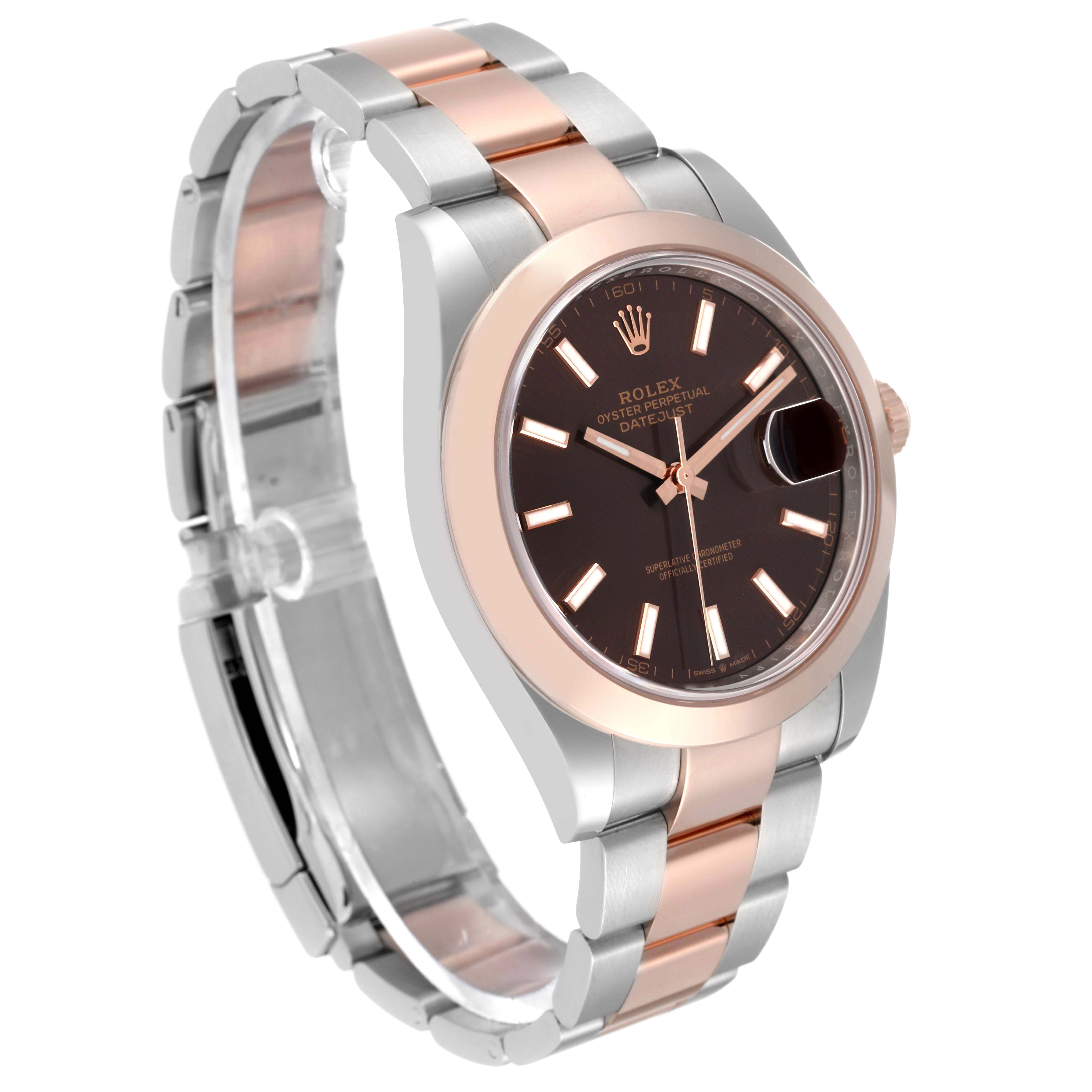 The image shows a side angle of the Rolex Datejust 41 126301 Men's Steel and Gold (two tone) Brown Dial 126301 Men's Steel and Gold (two tone) Brown Dial watch, highlighting its face, dial, bezel, case, and part of the bracelet.