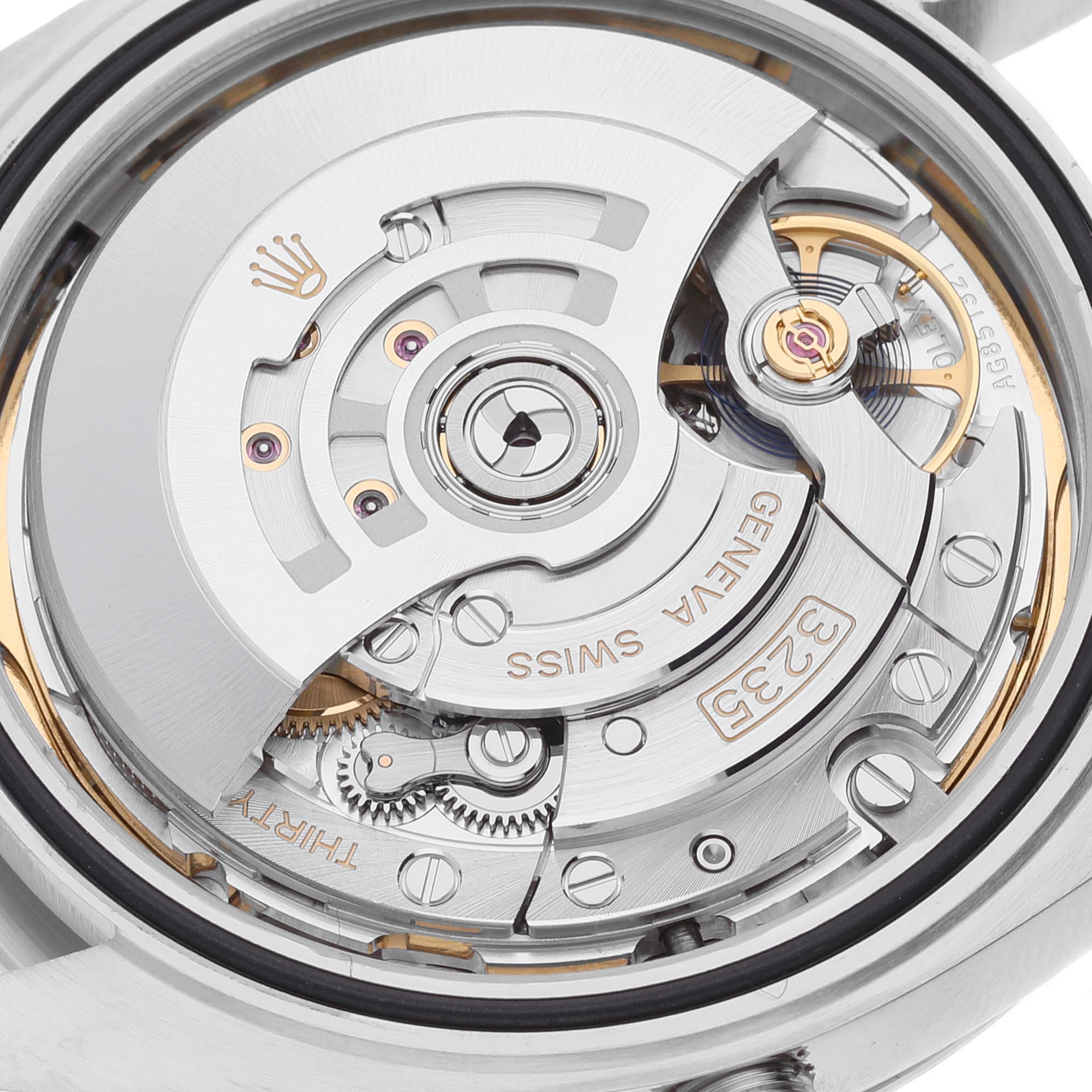 The image shows a detailed close-up view of the movement and internal components of the Rolex Datejust 41 126301 Men's Steel and Gold (two tone) Brown Dial 126301 Men's Steel and Gold (two tone) Brown Dial watch.