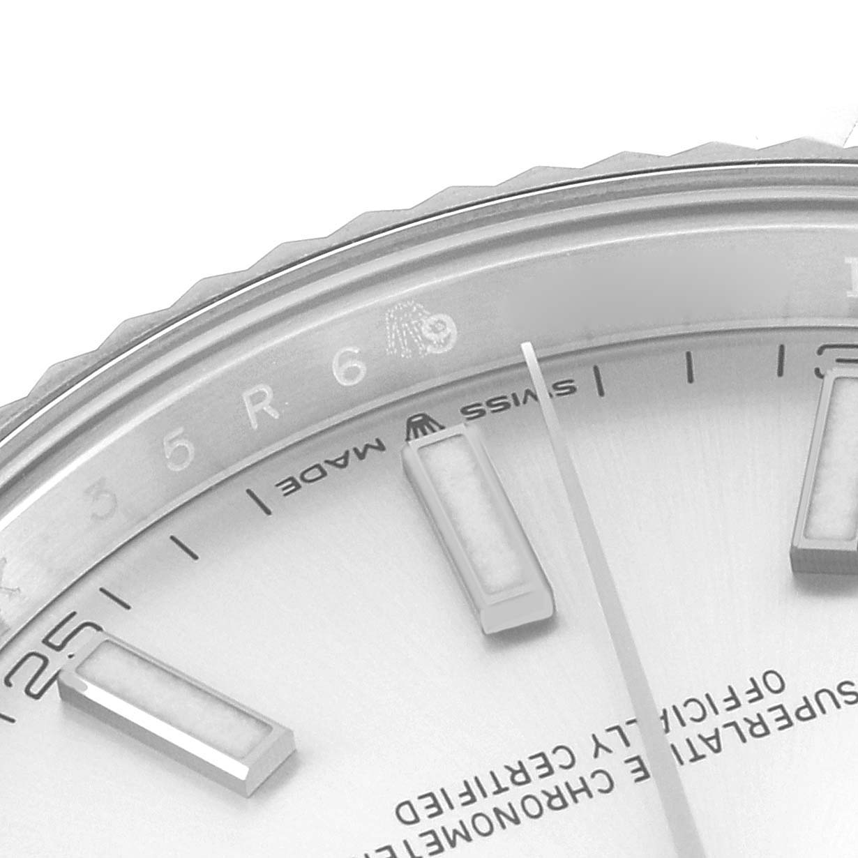 The image shows a close-up of the dial and bezel of a Rolex Datejust 41 126334 Men's Stainless Steel Silver Dial 126334 Men's Stainless Steel Silver Dial, focusing on hour markers and part of the minute hand.