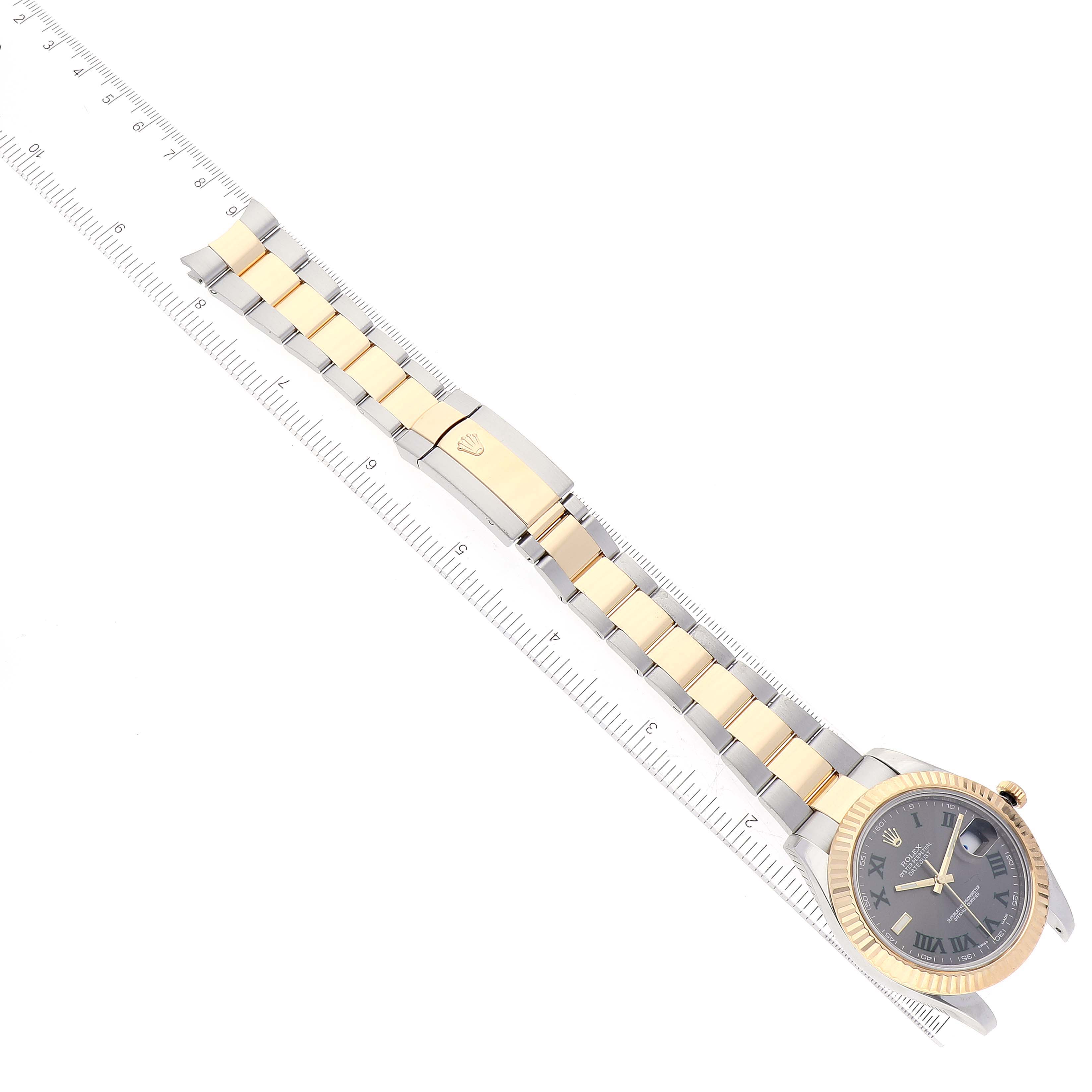 The image shows the top view of a Rolex Datejust 41 116333 Men's Steel and Gold (two tone) Grey Dial 116333 Men's Steel and Gold (two tone) Grey Dial model, highlighting its band and face with a ruler alongside for scale.