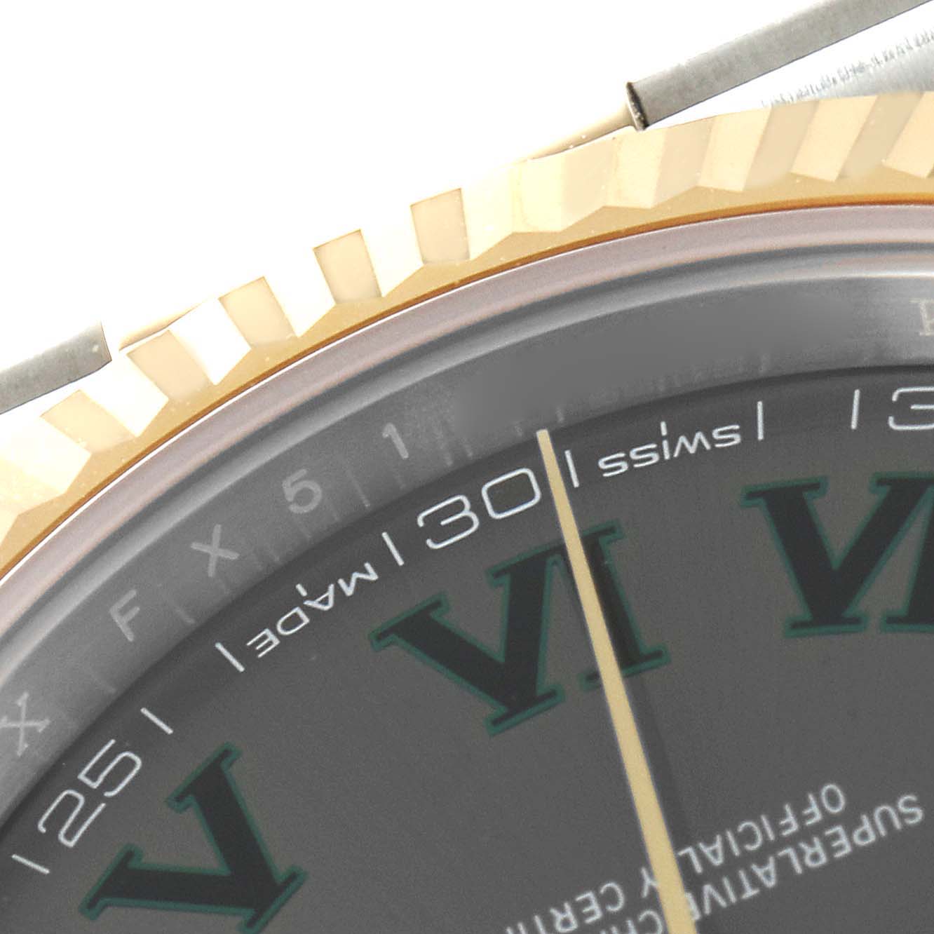 Close-up of the bezel, part of the dial, and Roman numerals of the Rolex Datejust 41 126333 Men's Steel and Gold (two tone) Grey Dial 126333 Men's Steel and Gold (two tone) Grey Dial watch.