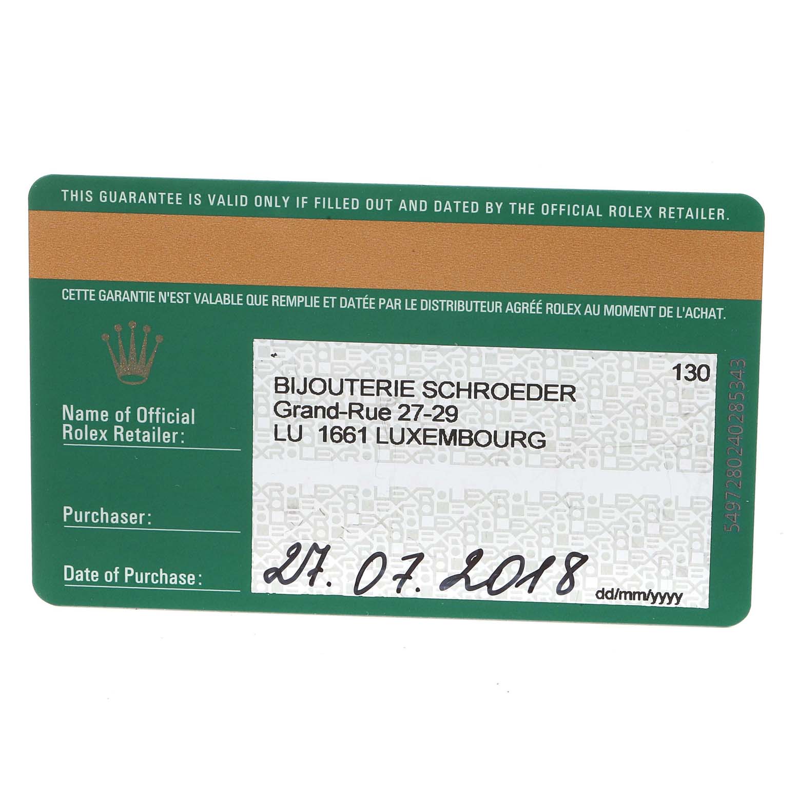 The image shows a close-up of the warranty card for a Rolex Datejust 41 126333 Men's Steel and Gold (two tone) Grey Dial 126333 Men's Steel and Gold (two tone) Grey Dial, including the retailer's information and date of purchase.