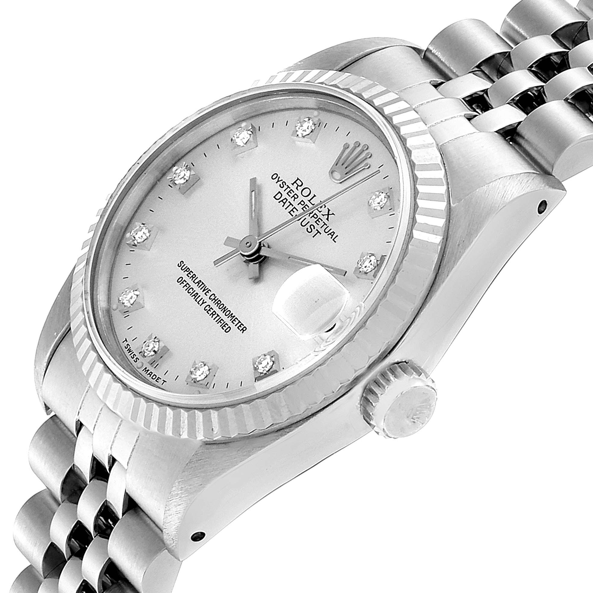The image shows a side angle of a Rolex Mid-Size 68274 Women's Stainless Steel Silver Dial 68274 Women's Stainless Steel Silver Dial Datejust watch displaying its dial, bezel, crown, and part of the bracelet.