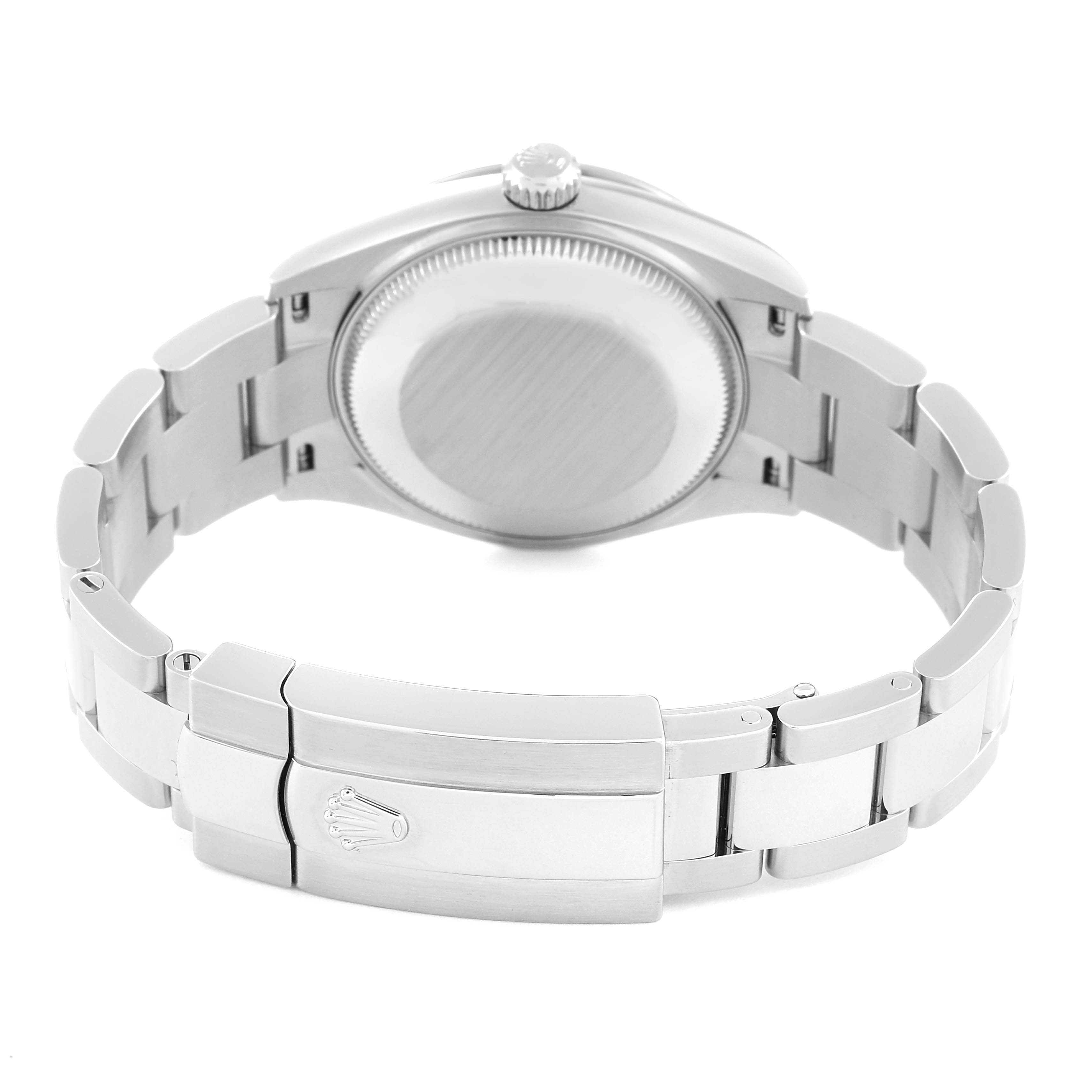 This image shows the back view of the Mid-Size Rolex watch, highlighting the case back, crown, and clasp with the brand's logo.