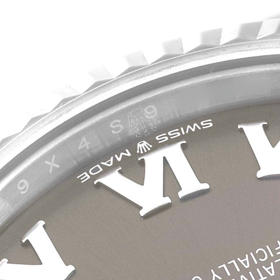This close-up image shows the dial and bezel of a Rolex Mid-Size 278274 Women's Stainless Steel Grey Dial 278274 Women's Stainless Steel Grey Dial watch, including part of the Roman numeral and "Swiss Made" text.