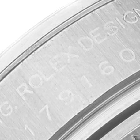 The image shows a close-up of the engraved bezel of a Rolex Datejust 179160 Women's Stainless Steel Pink Dial 179160 Women's Stainless Steel Pink Dial watch.