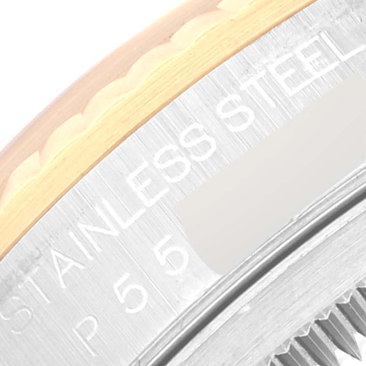 This image shows a close-up of the side edge of a Rolex Datejust 16233 Men's Steel and Gold (two tone) Black Dial 16233 Men's Steel and Gold (two tone) Black Dial watch, highlighting the stainless steel and inscription details.