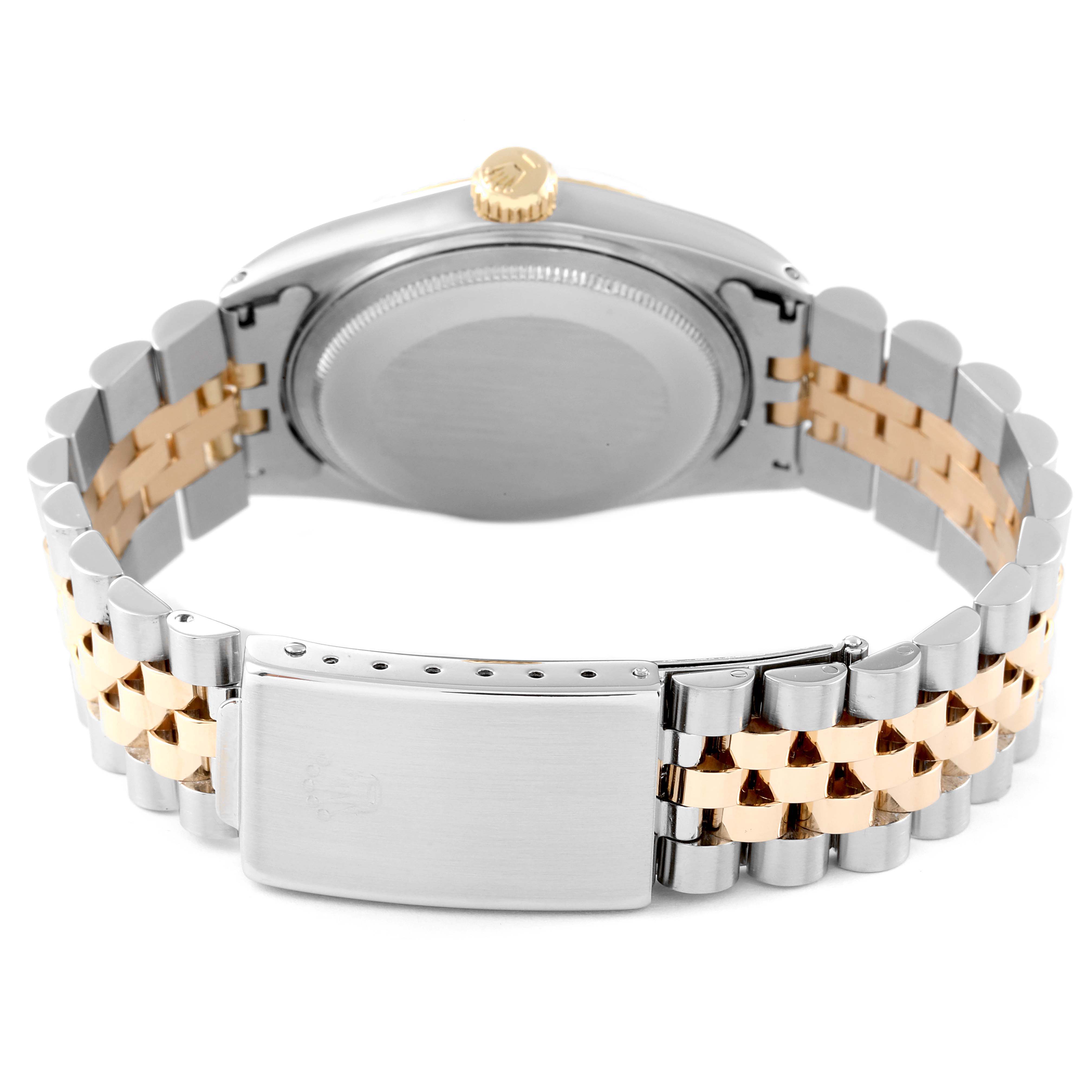 This image shows the back view of the Rolex Vintage Collection 1601 Men
s Steel and Gold (two tone) Champagne Dial 1601 Men
s Steel and Gold (two tone) Champagne Dial watch, featuring its case back, crown, and two-tone bracelet.