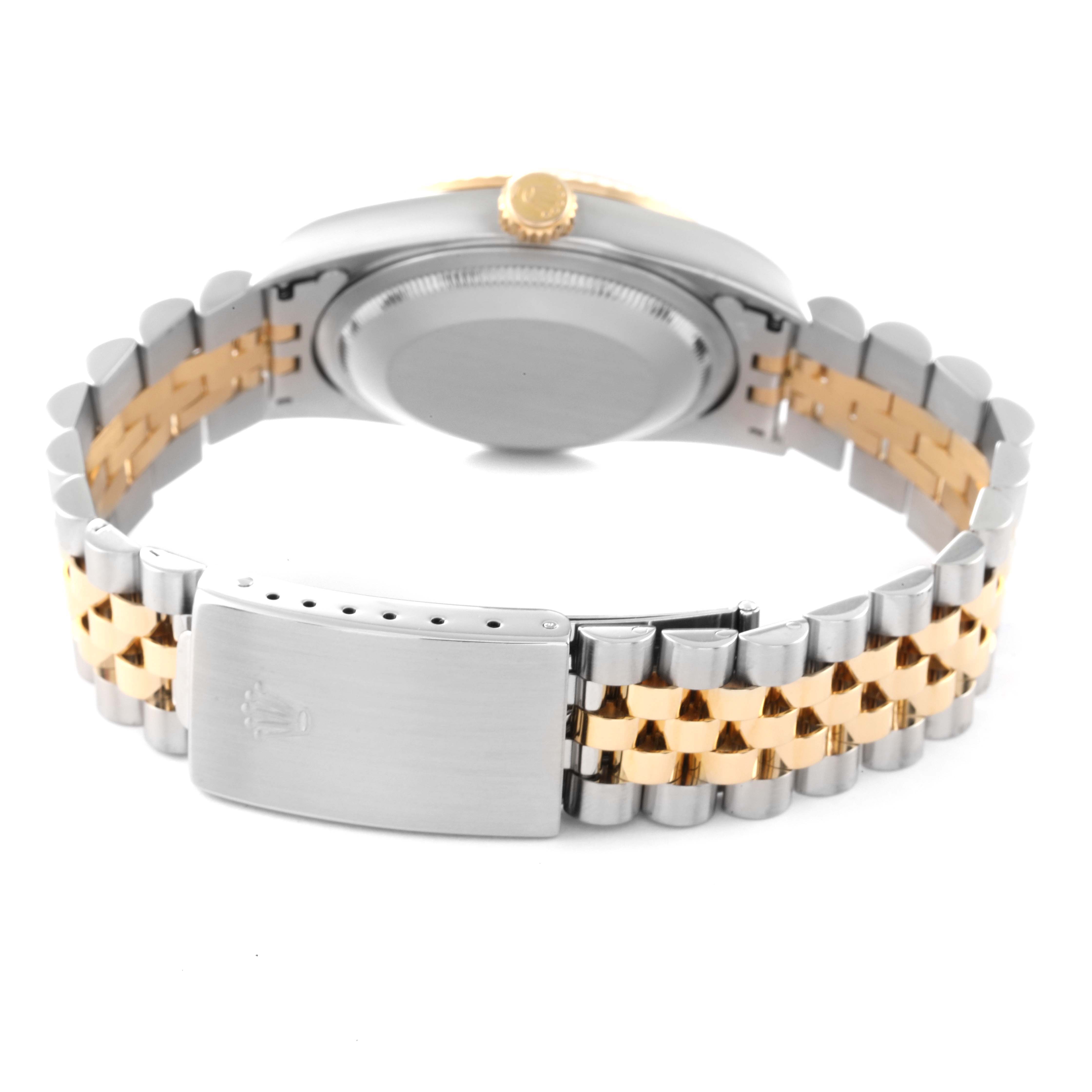 The image shows the back of a Rolex Datejust 16233 Men's Steel and Gold (two tone) Champagne Dial 16233 Men's Steel and Gold (two tone) Champagne Dial watch, highlighting the case back, crown, and bicolored bracelet.