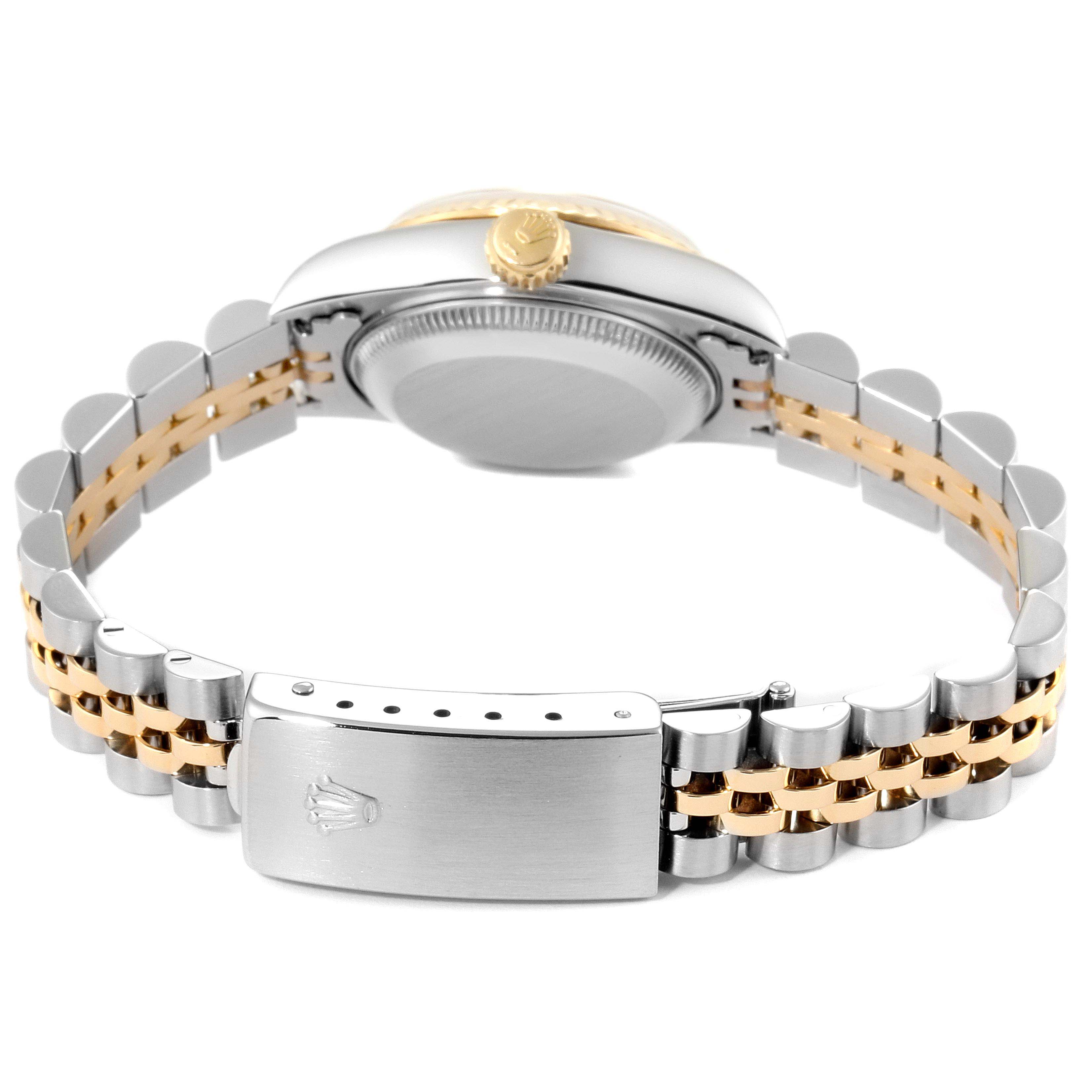 The image shows the Rolex Datejust 69173 Women's Steel and Gold (two tone) Champagne Dial 69173 Women's Steel and Gold (two tone) Champagne Dial watch from the back and side, highlighting the bracelet, clasp, and crown.