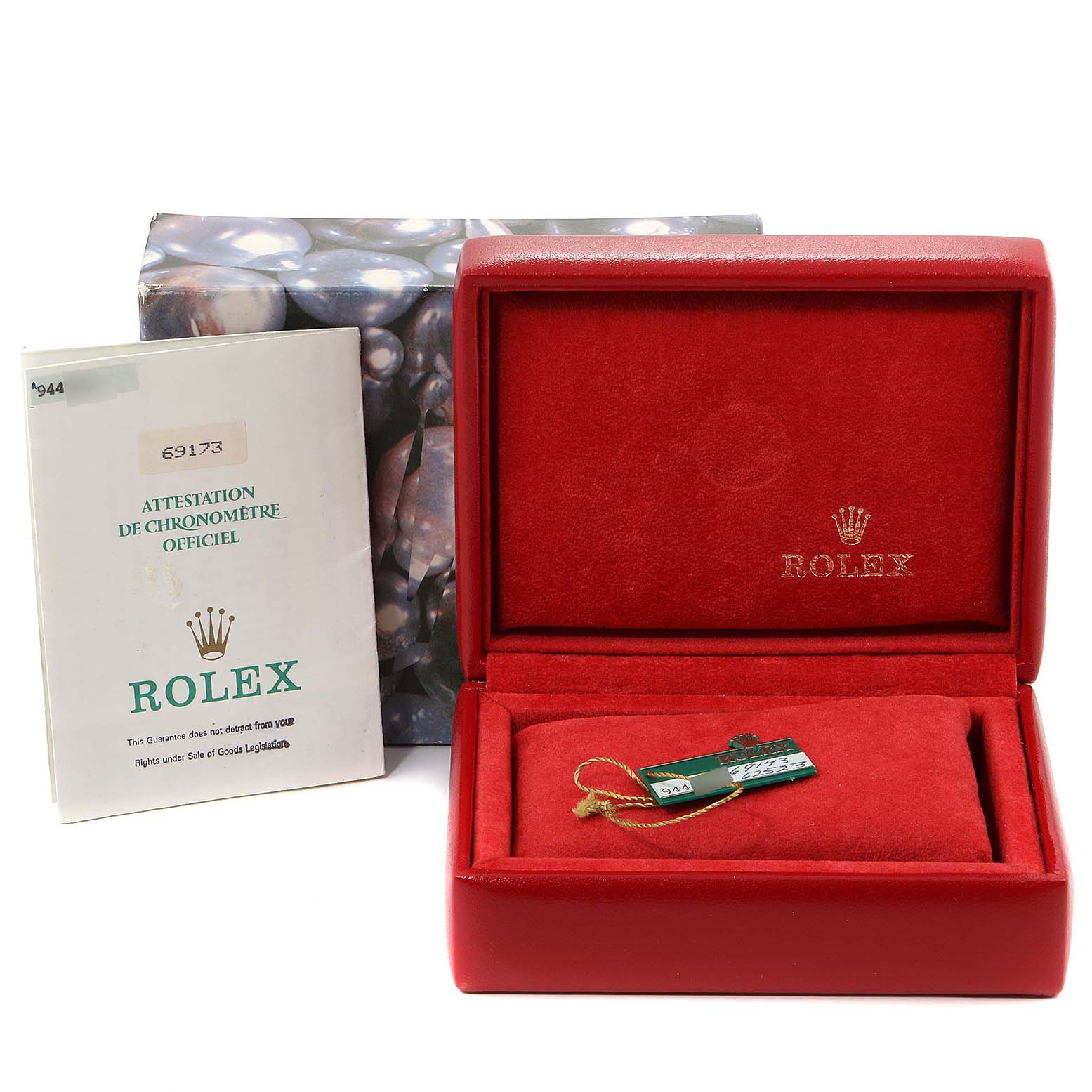 This image shows a Rolex Datejust 69173 Women's Steel and Gold (two tone) Champagne Dial 69173 Women's Steel and Gold (two tone) Champagne Dial watch box, official chronometer certification, and a tag, from a front angle.