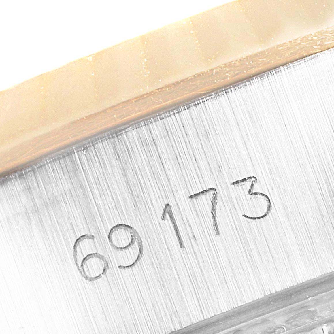 This image shows a close-up of the serial number "69173" engraved on the side of a Rolex Datejust 69173 Women's Steel and Gold (two tone) Champagne Dial 69173 Women's Steel and Gold (two tone) Champagne Dial watch case.