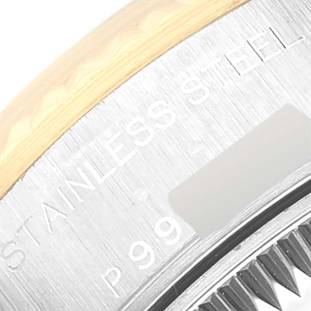 This image shows a close-up of the stainless steel and gold bezel with engravings on the case of a Rolex Datejust 79173 Women's Steel and Gold (two tone) Mother of Pearl Dial 79173 Women's Steel and Gold (two tone) Mother of Pearl Dial watch.