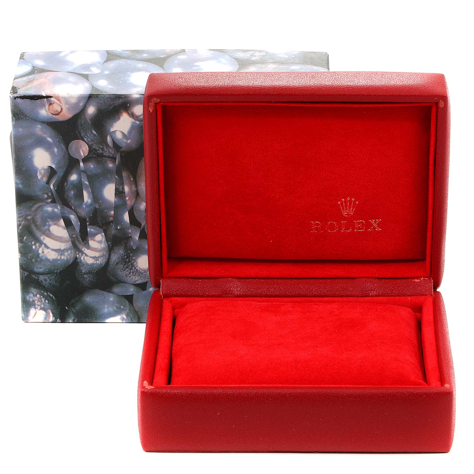 This image shows an empty Rolex Datejust 79173 Women's Steel and Gold (two tone) Mother of Pearl Dial 79173 Women's Steel and Gold (two tone) Mother of Pearl Dial watch box and its outer decorative packaging.