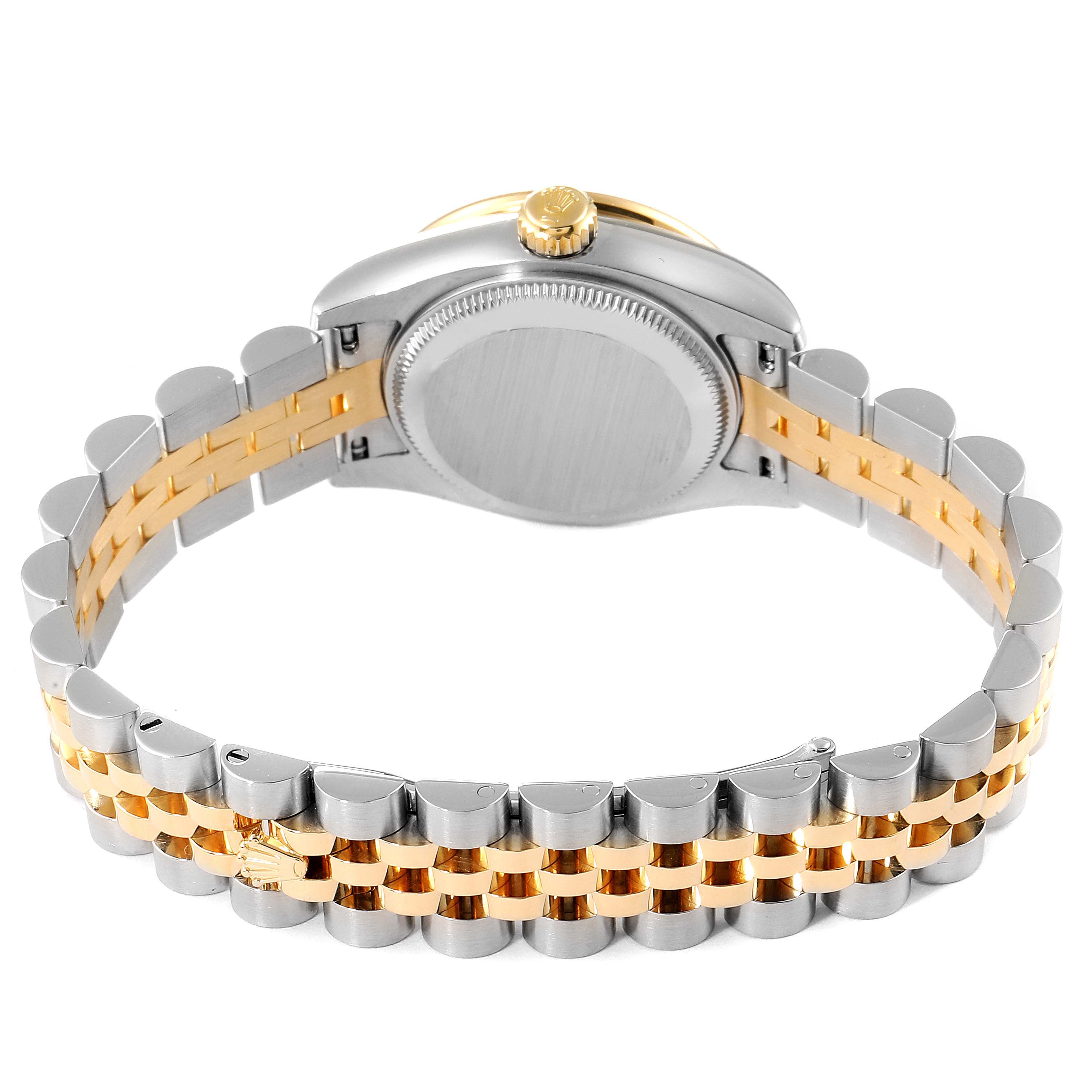 This image shows the backside and bracelet of a Rolex Datejust 179383 Women
s Steel and Gold (two tone) Silver Dial 179383 Women
s Steel and Gold (two tone) Silver Dial watch, highlighting its two-tone metal design and crown.
