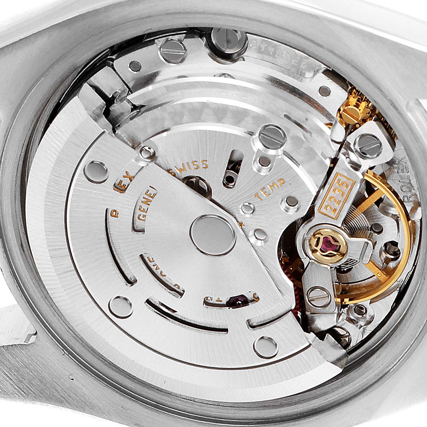 This image shows a close-up view of the movement inside a Rolex Datejust 179383 Women
s Steel and Gold (two tone) Silver Dial 179383 Women
s Steel and Gold (two tone) Silver Dial watch, highlighting intricate components and engravings.