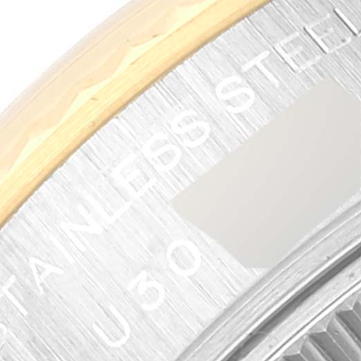 This close-up image shows a partial view of the stainless steel casing and gold bezel of a Rolex Datejust 69173 Women's Steel and Gold (two tone) White Dial 69173 Women's Steel and Gold (two tone) White Dial watch.