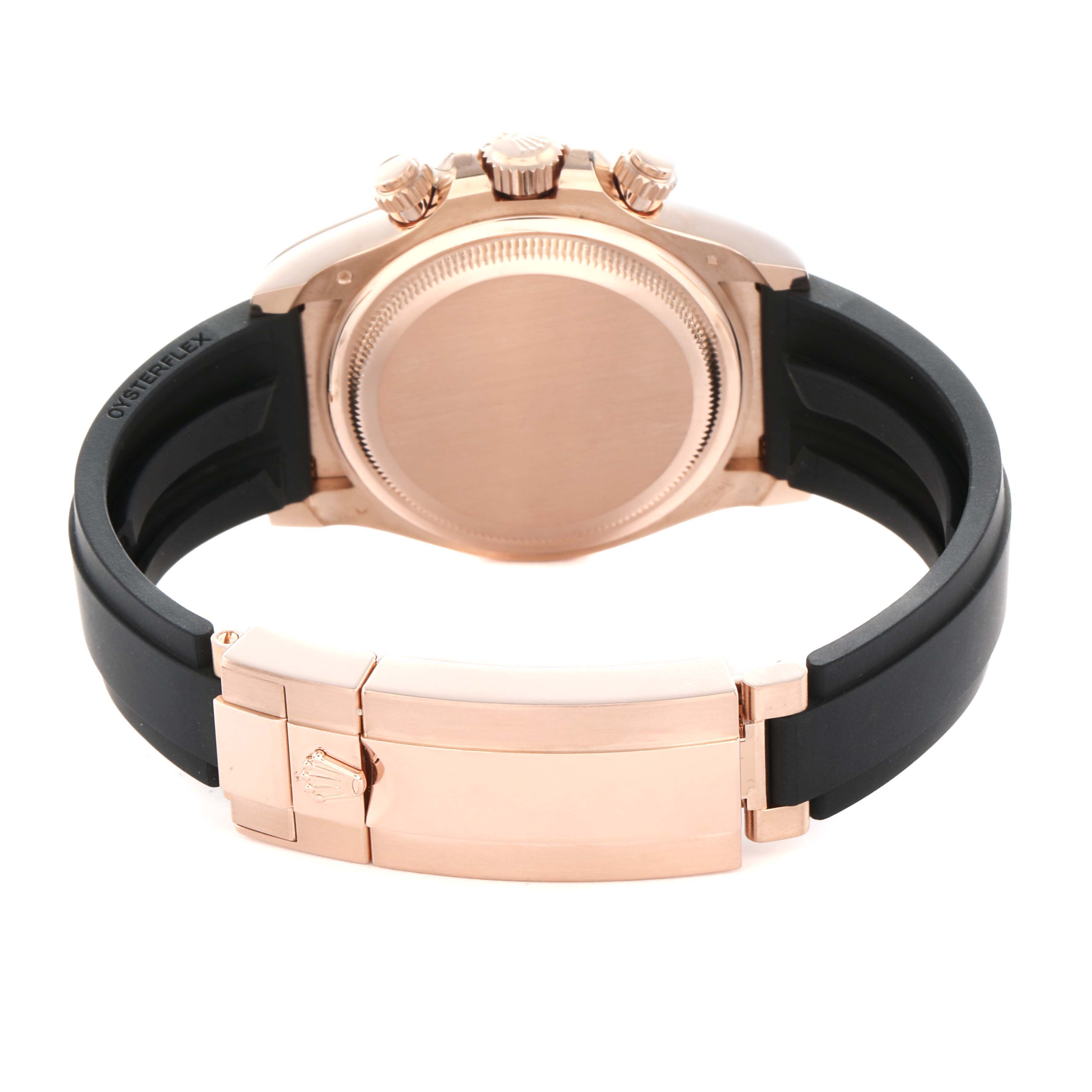 The image shows the back view of a Rolex Daytona 126515 Men
s Rose Gold Black Dial watch, highlighting the case back, crown, pushers, and Oysterflex bracelet.