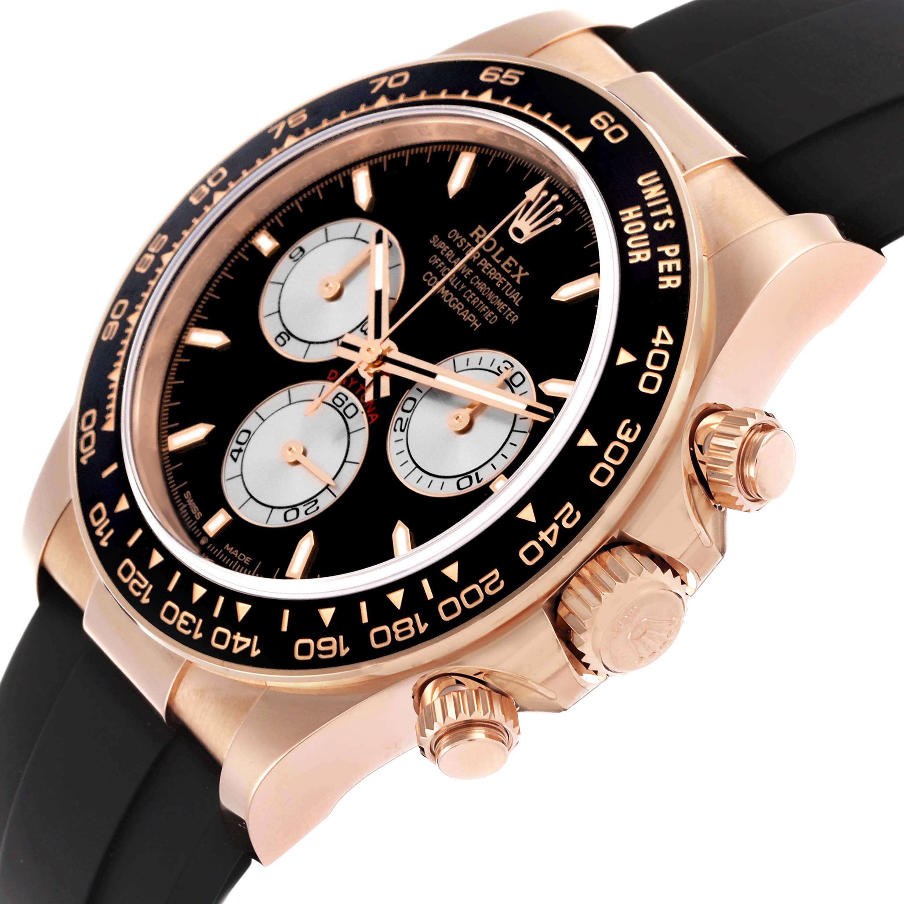 The Rolex Daytona 126515 Men
s Rose Gold Black Dial watch is shown at an angle highlighting the dial, bezel, crown, and chronograph pushers.