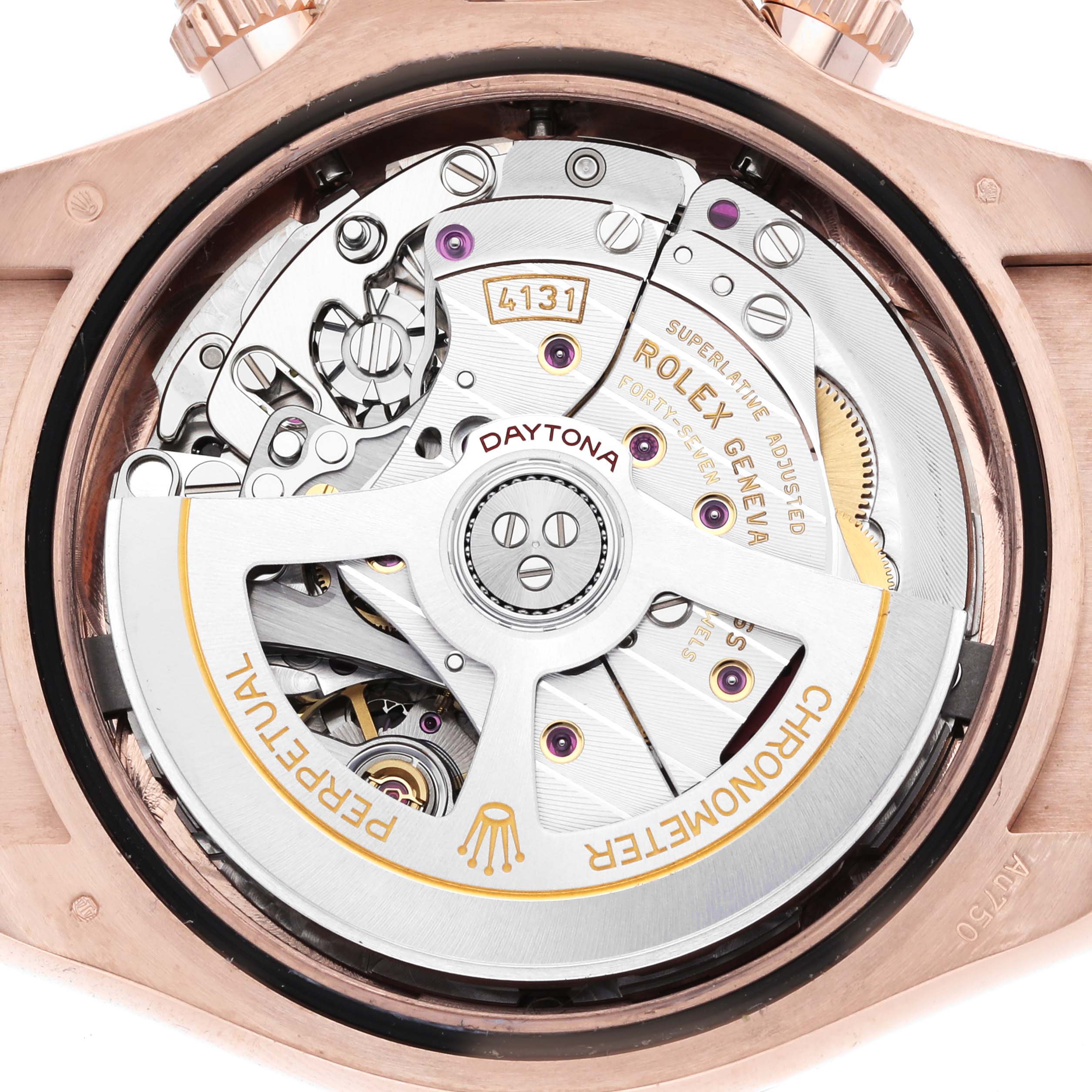 The image shows the inner mechanism of a Rolex Daytona 126515 Men
s Rose Gold Black Dial watch, specifically the movement, viewed from the back.