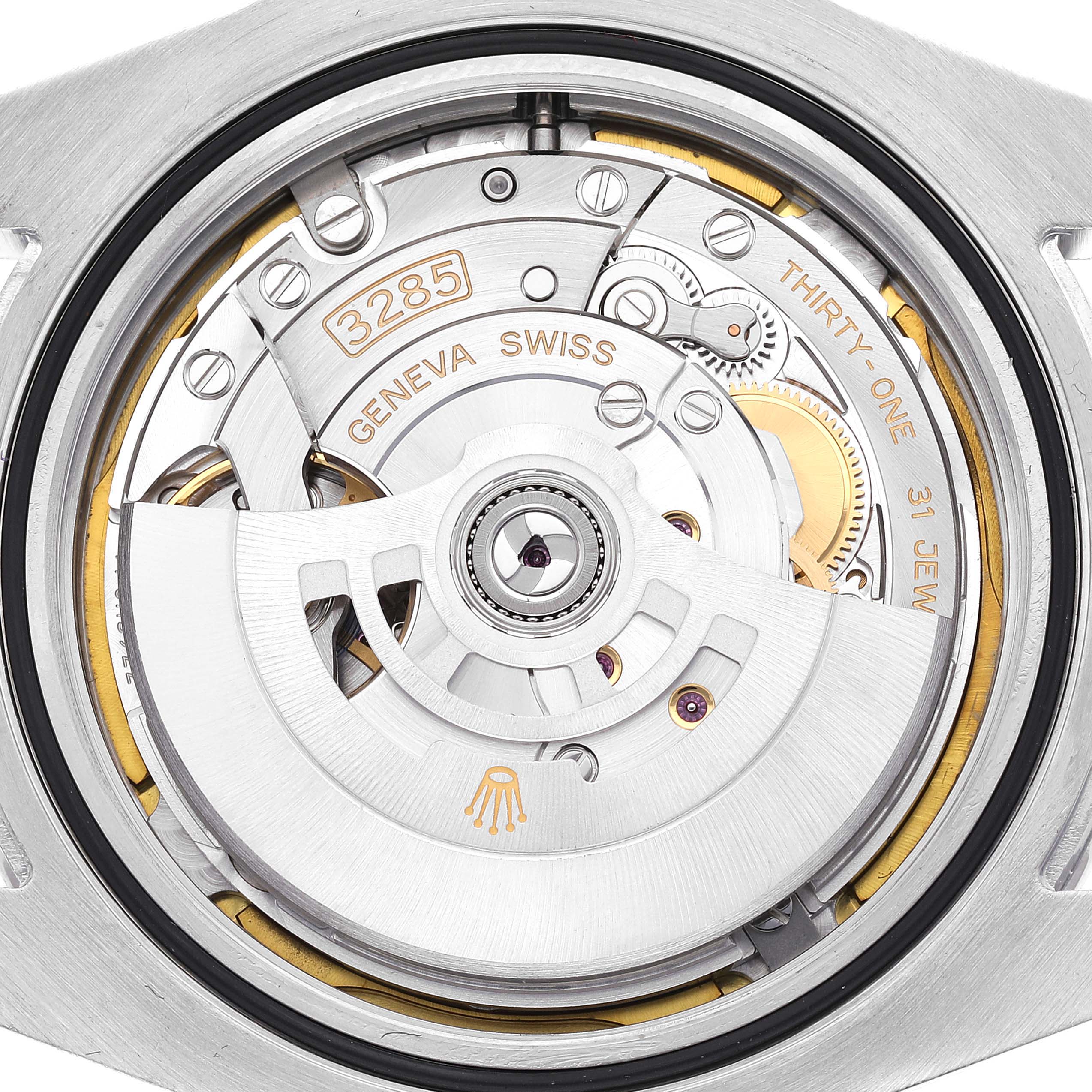 This image shows the movement and inner mechanics of a Rolex Explorer 226570 Men
s Stainless Steel White Dial 226570 Men
s Stainless Steel White Dial watch, featuring its intricate components and engravings.