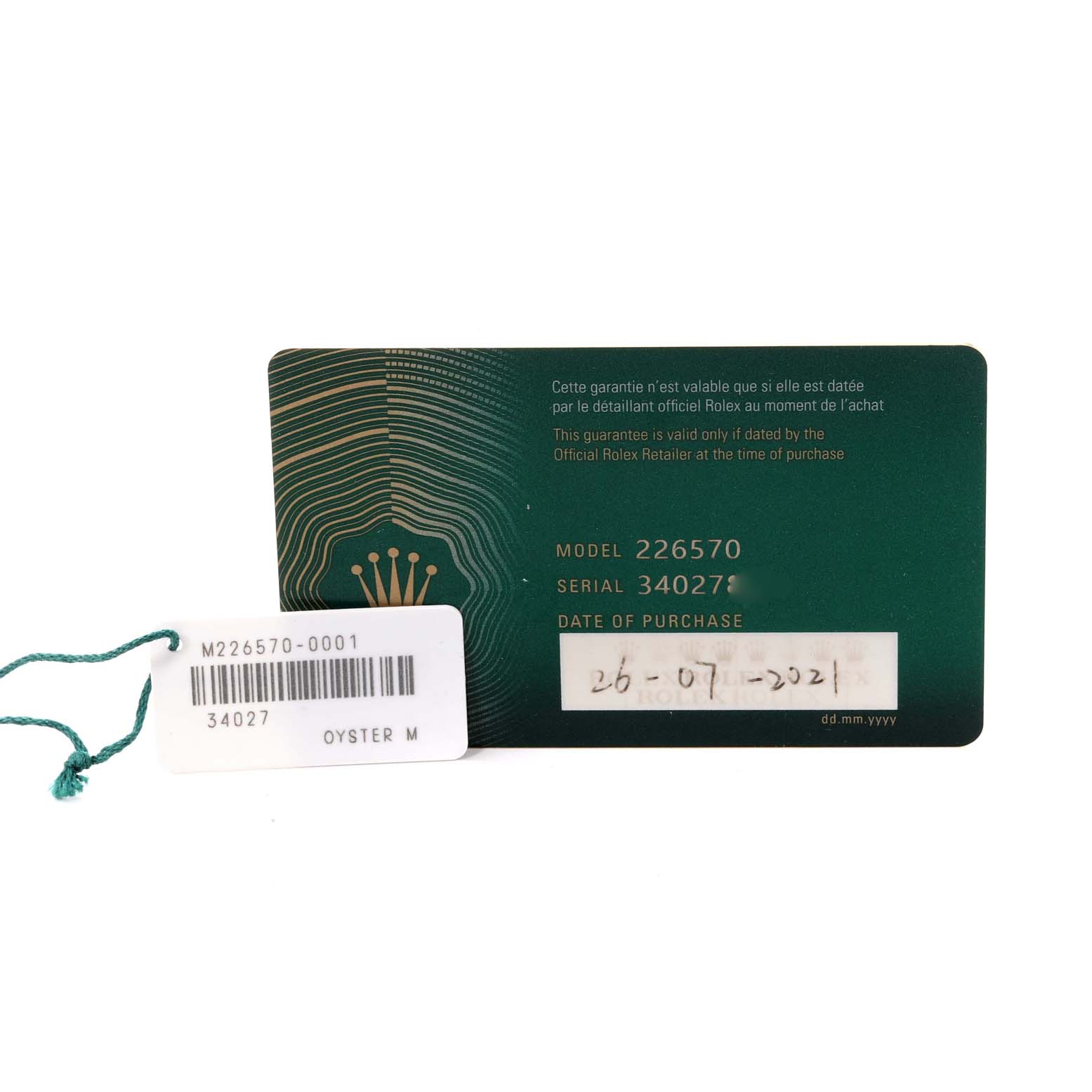 The image shows the warranty card and tag for the Rolex Explorer 226570 Men
s Stainless Steel White Dial 226570 Men
s Stainless Steel White Dial model 226570.