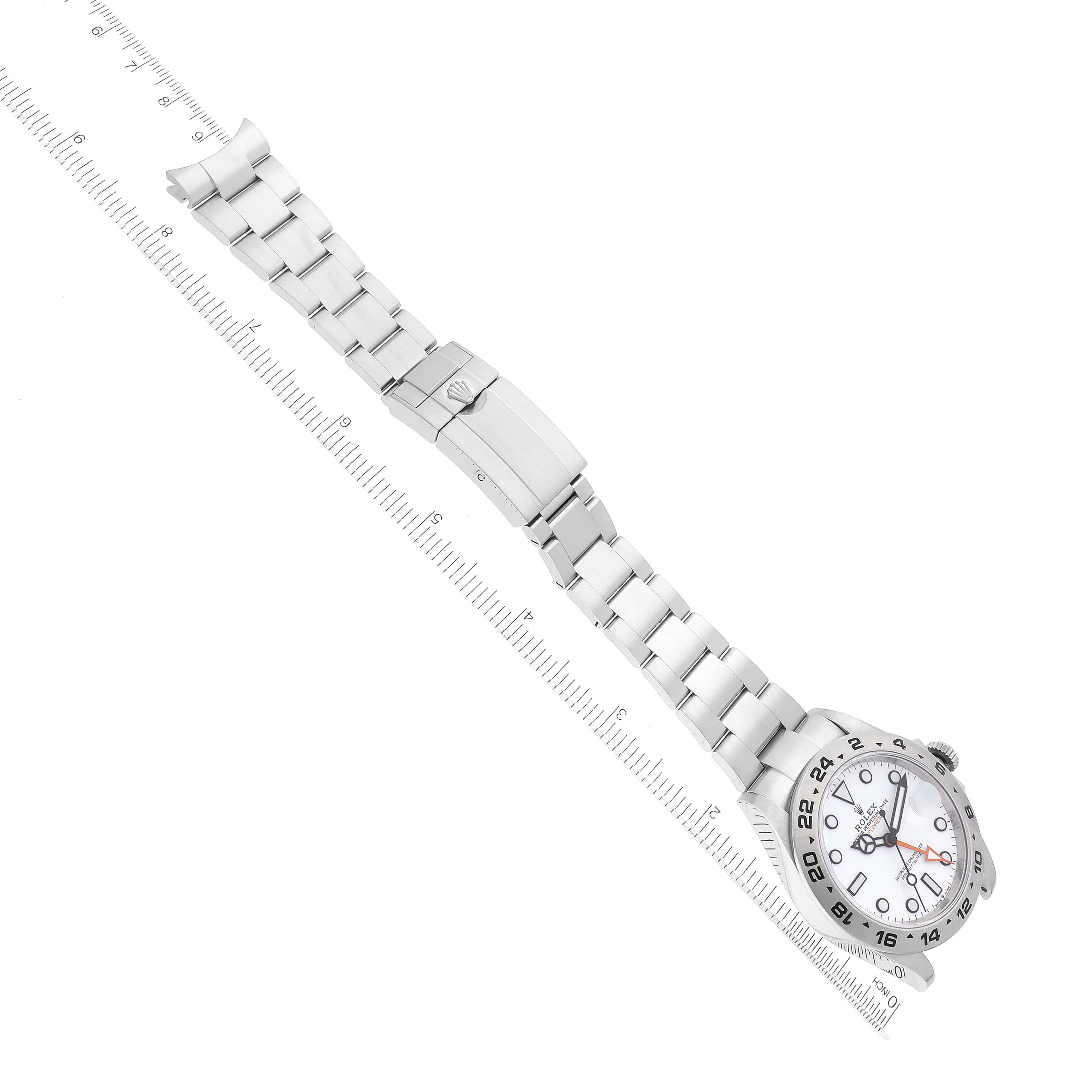 The image shows a Rolex Explorer 226570 Men
s Stainless Steel White Dial 226570 Men
s Stainless Steel White Dial watch laid flat, featuring the face, bezel, and fully extended bracelet with clasp.