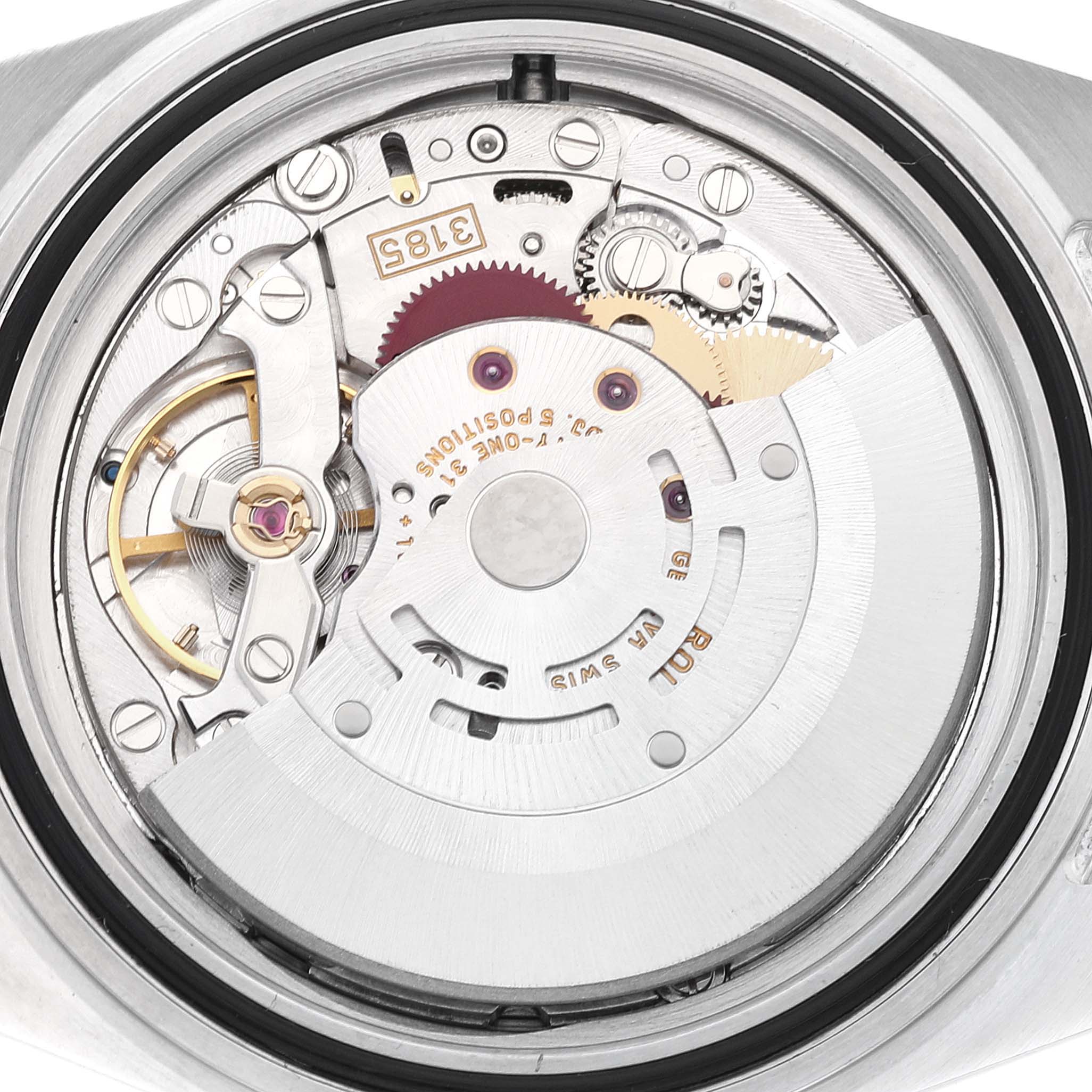 This image shows a close-up of the Rolex Explorer 16570 Men
s Stainless Steel Black Dial 16570 Men
s Stainless Steel Black Dial model
s internal movement mechanism from the back angle.