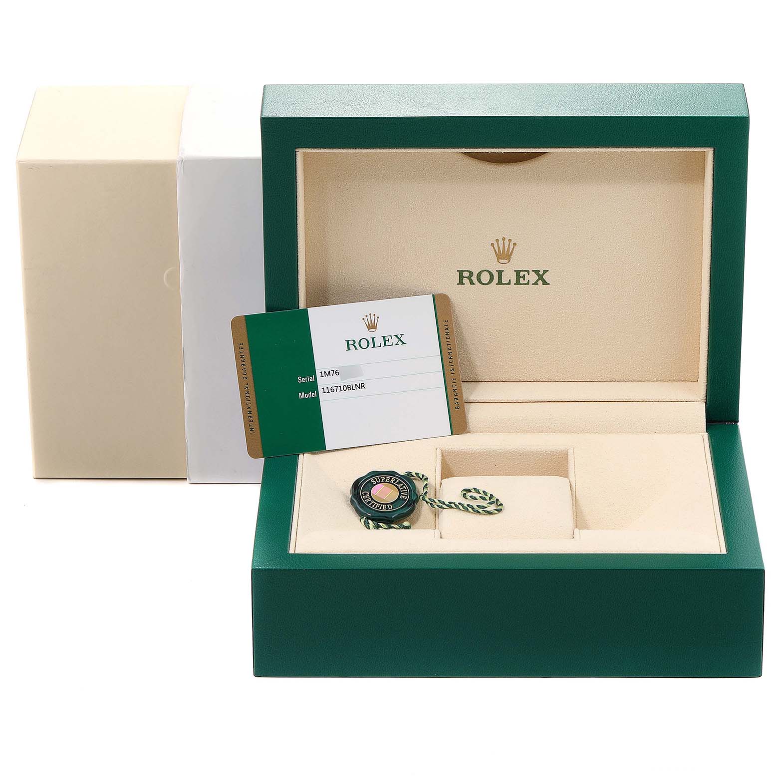 This image shows the open packaging box for a Rolex GMT-Master 116710 Men's Stainless Steel Black Dial 116710 Men's Stainless Steel Black Dial watch with the warranty card and a green tag included.
