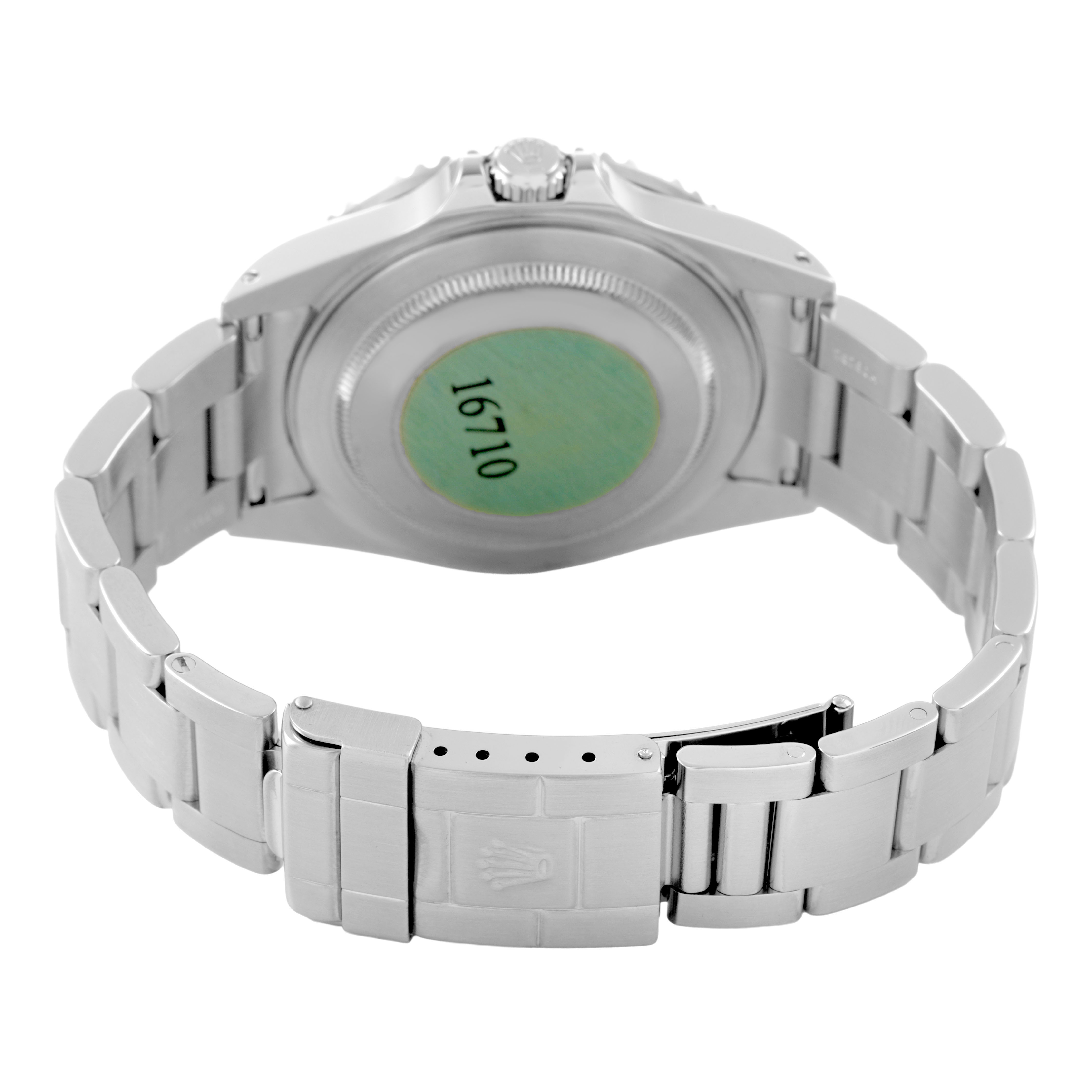 The image shows the back of the Rolex GMT-Master Men's Stainless Steel Black Dial watch, highlighting the case back and bracelet.
