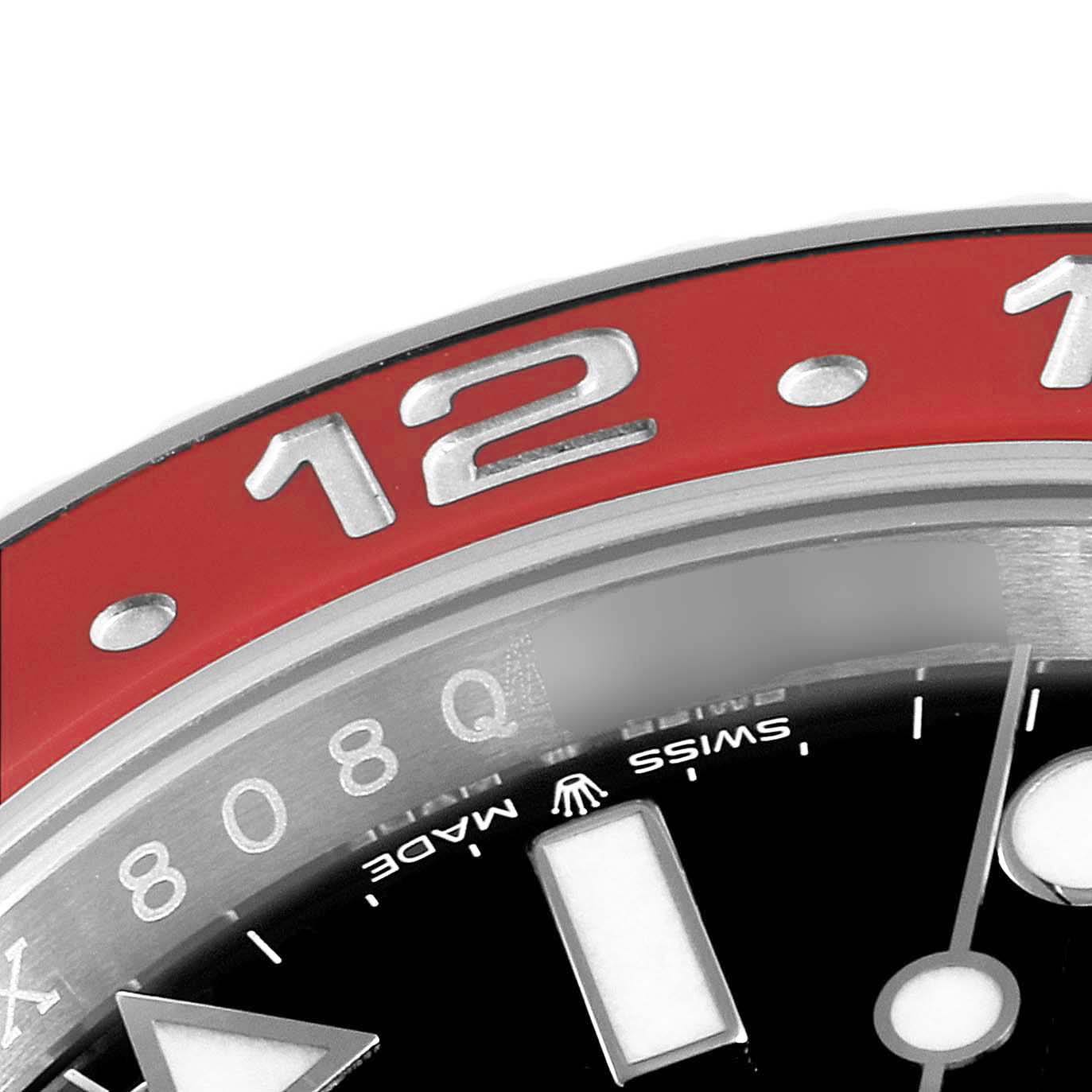This is a close-up view of the dial and the red bezel of a Rolex GMT-Master 126710 Men
s Stainless Steel Black Dial 126710 Men
s Stainless Steel Black Dial watch, showing the "12" marker and part of the "Swiss Made" text.