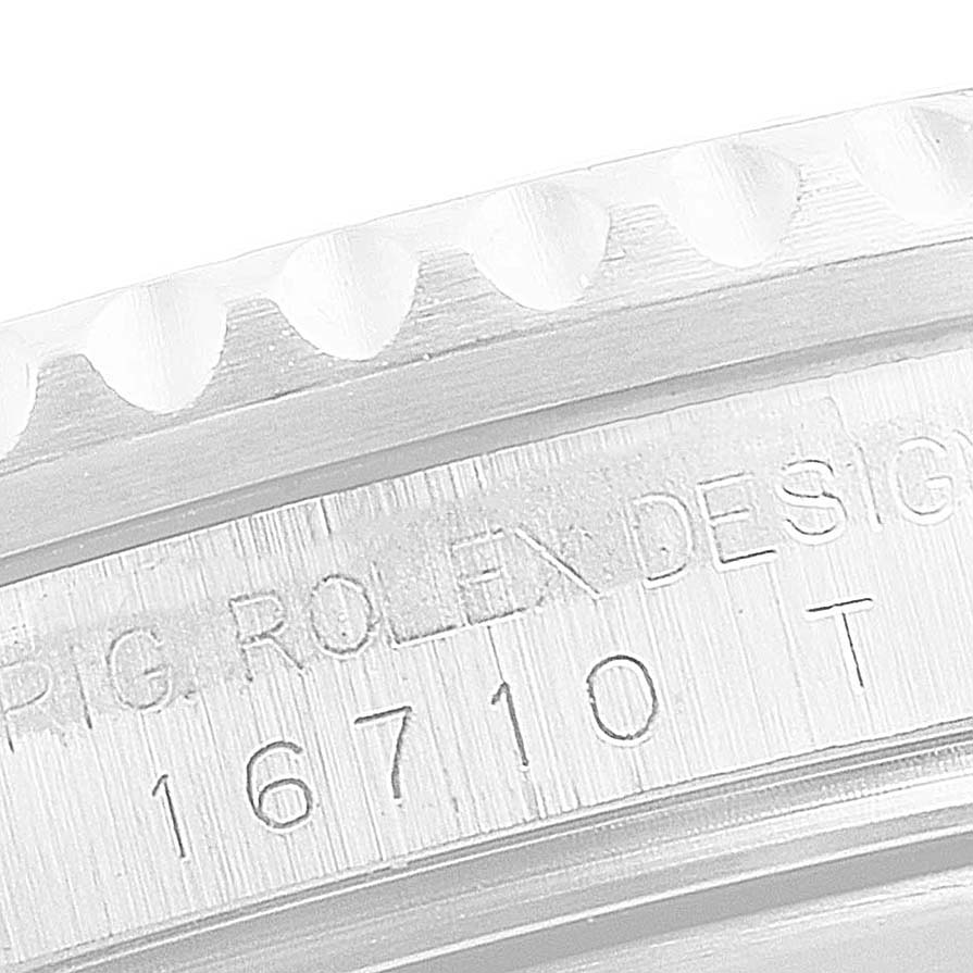 This image shows a close-up of the case side of a Rolex GMT-Master 16710 Men
s Stainless Steel Black Dial 16710 Men
s Stainless Steel Black Dial, focusing on the model number 16710 engraved on the side.