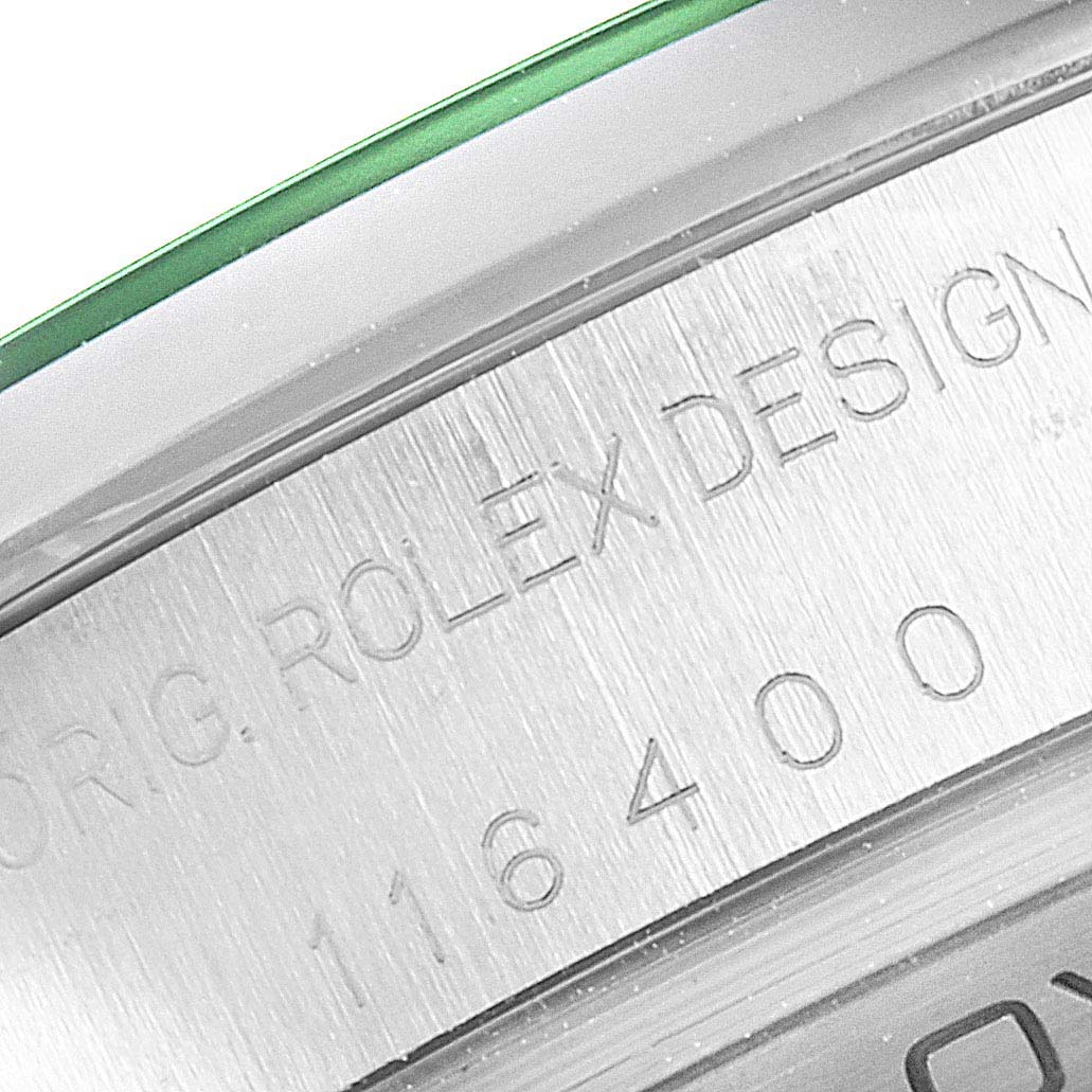 Close-up view of the engraved model number and "ROLEX DESIGN" text on a Rolex Milgauss 116400GV Men's Stainless Steel Blue Dial 116400GV Men's Stainless Steel Blue Dial watch case.