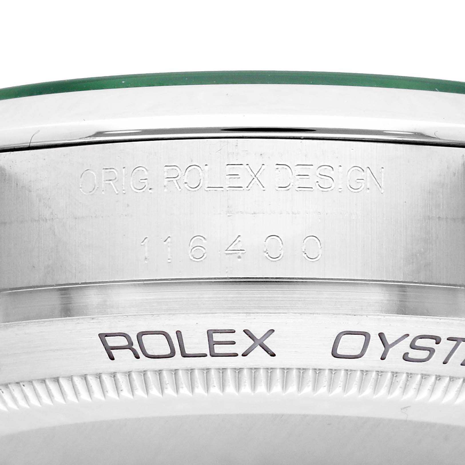 The image shows a close-up side angle of a Rolex Milgauss 116400 Men's Stainless Steel Blue Dial, highlighting the etched case side and part of the bezel.