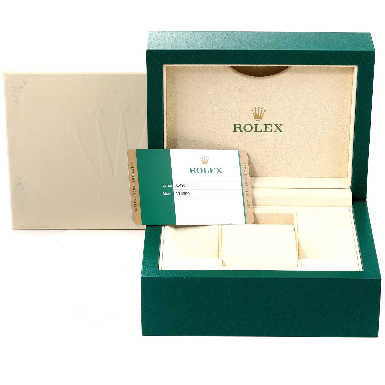 The image shows an open display box for a Rolex Oyster Perpetual 114300 Men
s Stainless Steel Black Dial 114300 Men
s Stainless Steel Black Dial watch, including a model and serial number card.