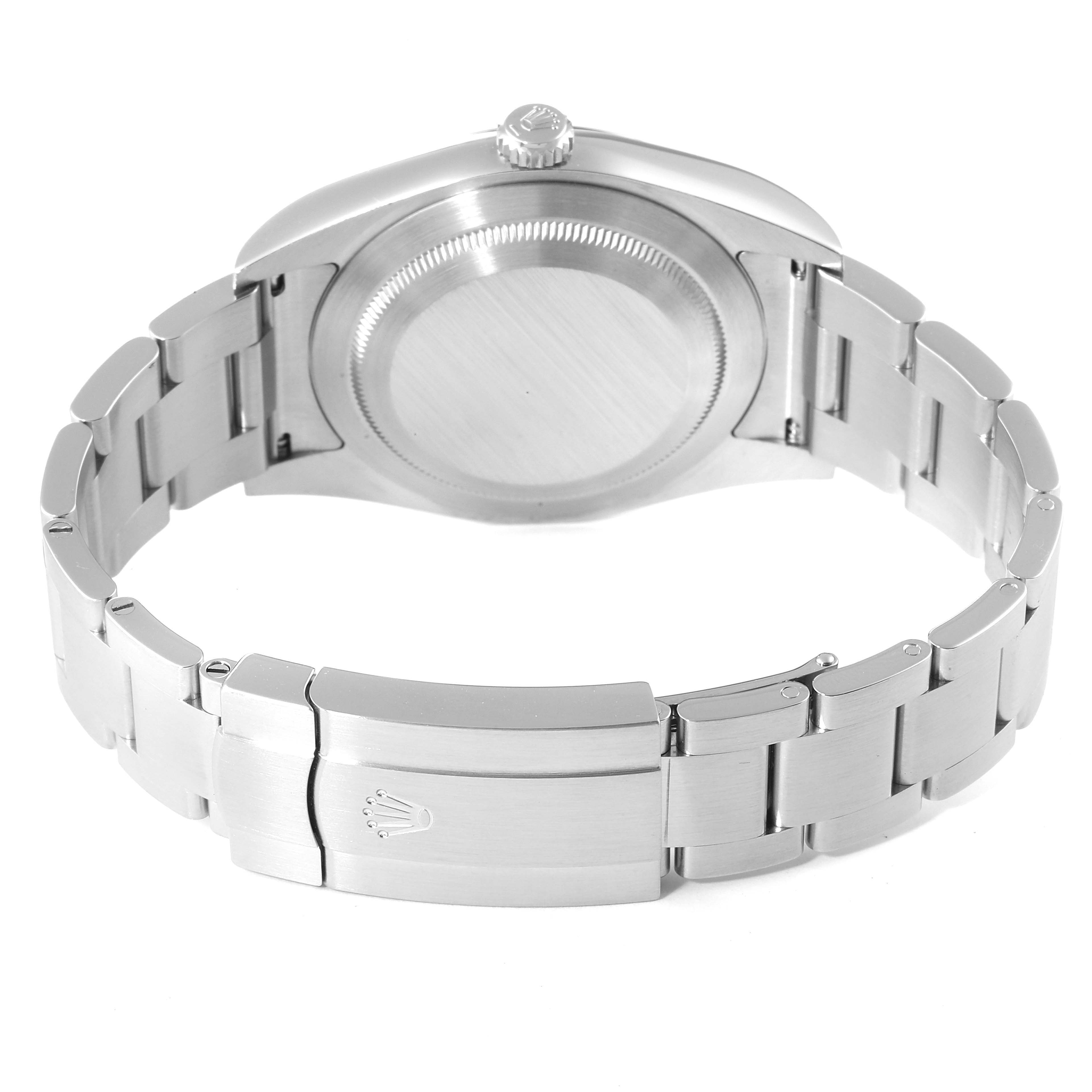 The image shows the back case and bracelet of a Rolex Oyster Perpetual 114300 Men
s Stainless Steel Black Dial 114300 Men
s Stainless Steel Black Dial watch, highlighting its clasp and links.