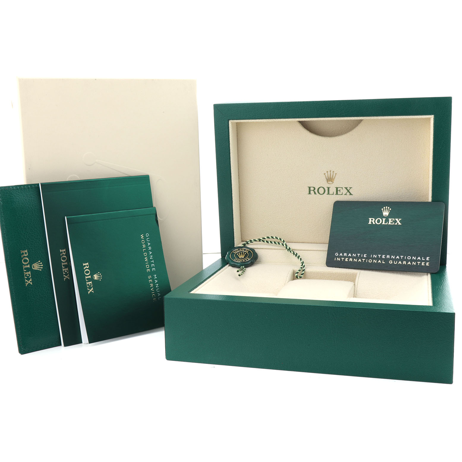 The image shows the Rolex Oyster Perpetual 134300 Men's Stainless Steel Pink Dial packaging, with the box, guarantee card, and manual visible.