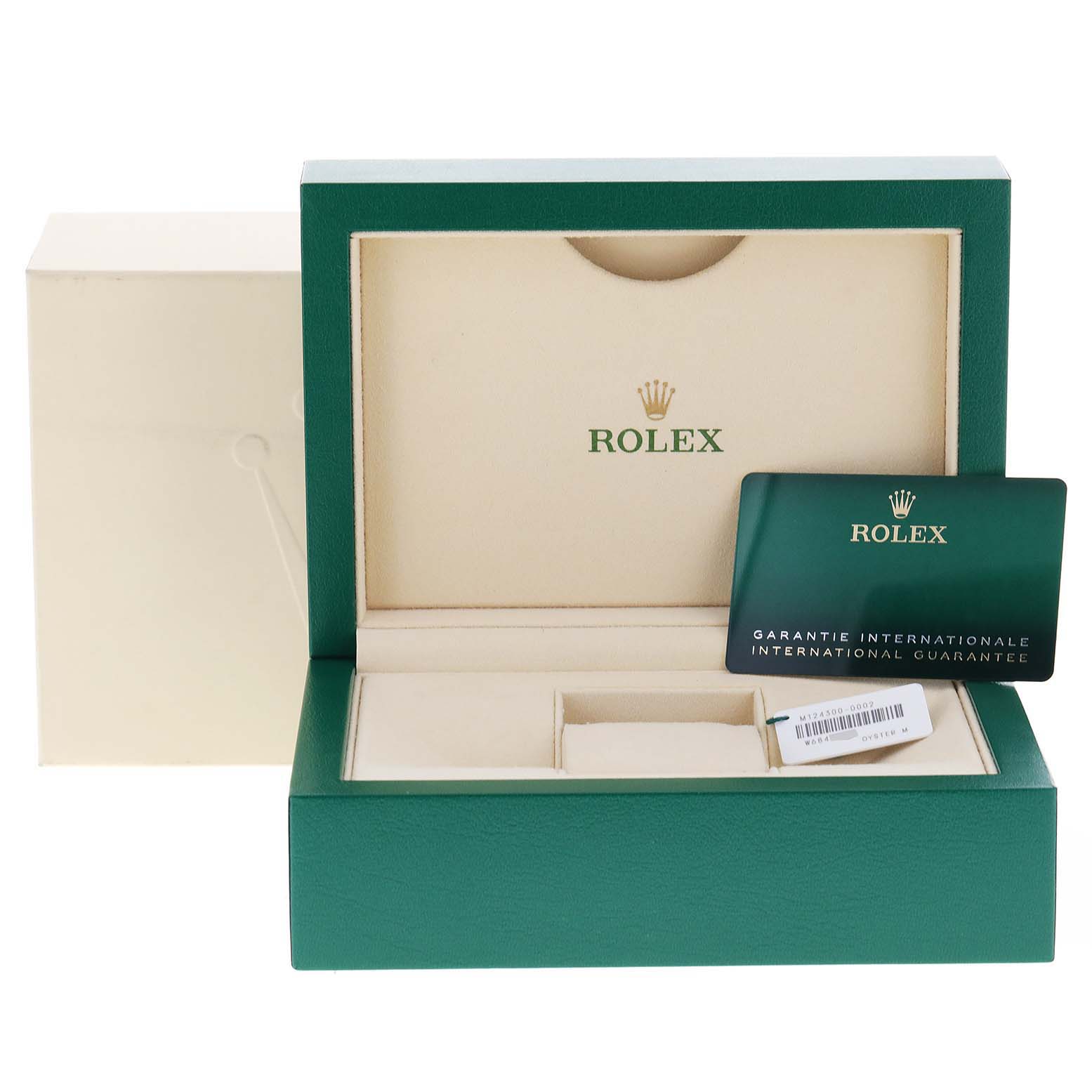 This image shows the opened box and international guarantee card for a Rolex Oyster Perpetual 124300 Men
s Stainless Steel Black Dial 124300 Men
s Stainless Steel Black Dial watch.