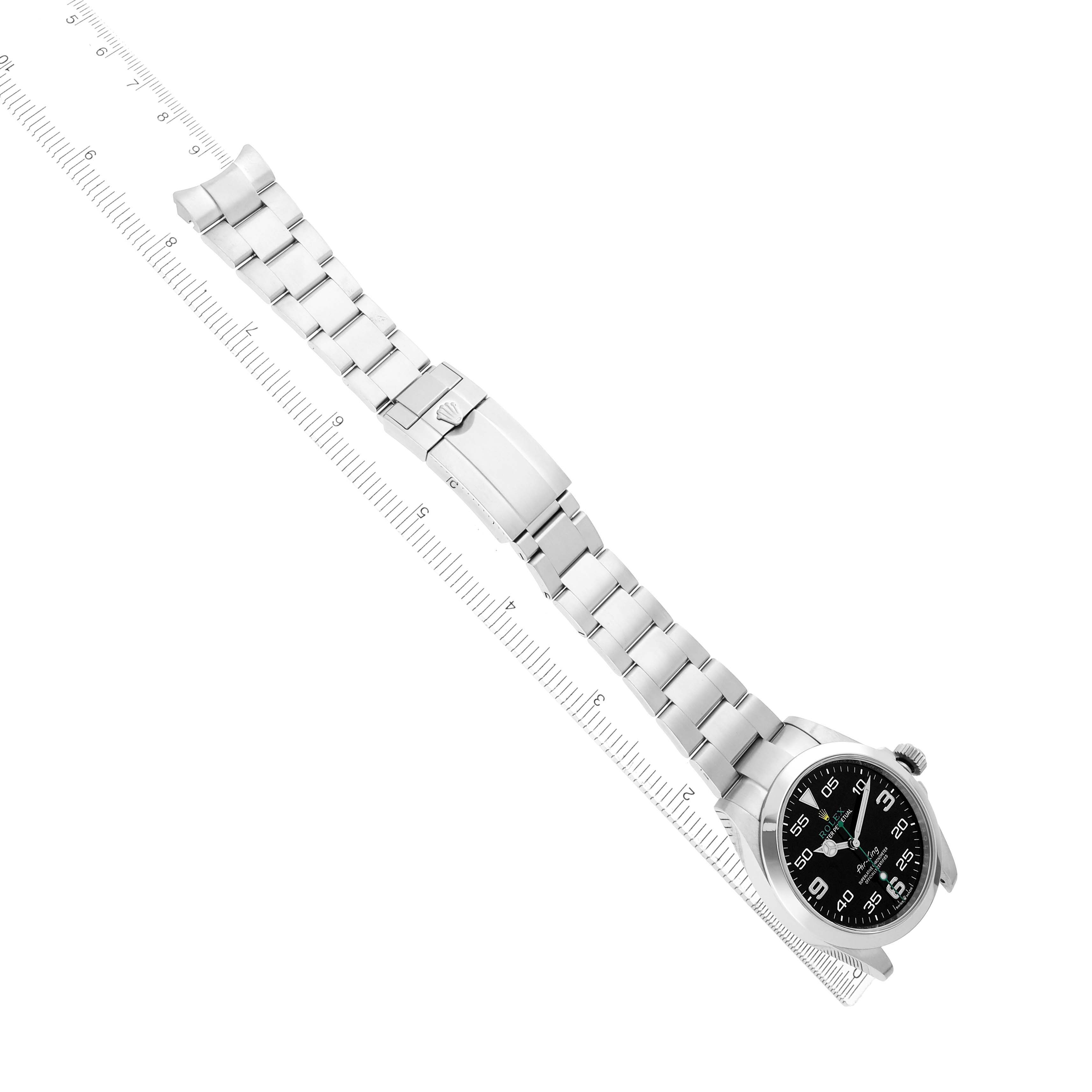 The Rolex Air-King 126900 Men
s Stainless Steel Black Dial watch is shown from a top-down angle, highlighting the full bracelet and watch face.