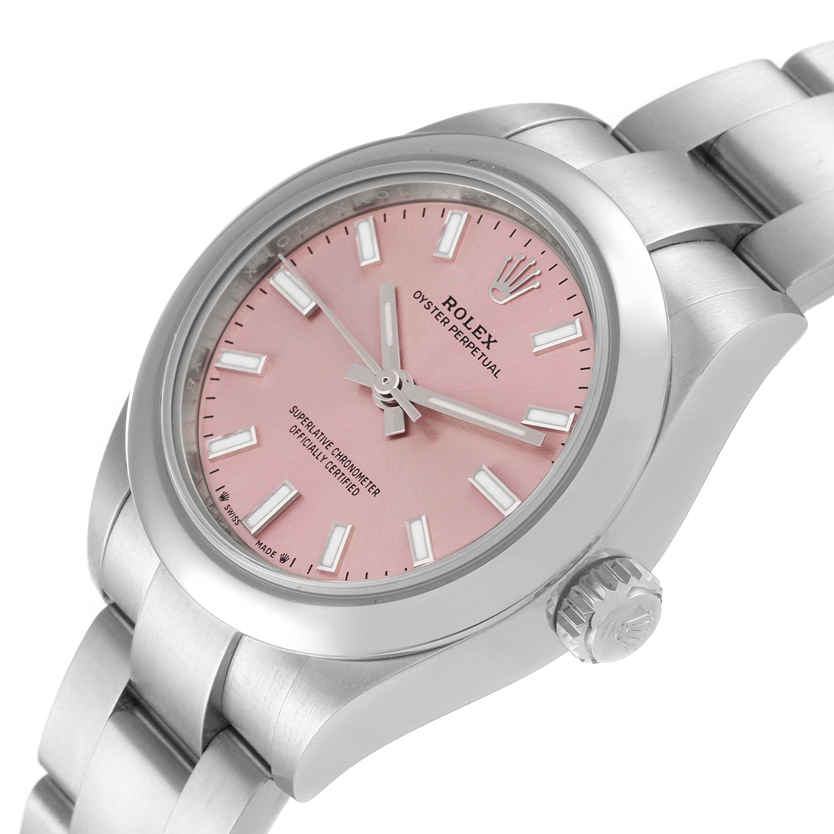 The image shows a Rolex Oyster Perpetual 276200 Women
s Stainless Steel Pink Dial 276200 Women
s Stainless Steel Pink Dial watch at an angle highlighting its pink dial, bezel, crown, and part of the bracelet.