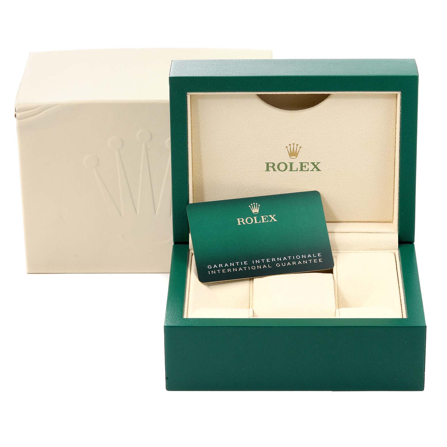 The image shows a green box and an international guarantee card for the Rolex Oyster Perpetual 276200 Women
s Stainless Steel Pink Dial 276200 Women
s Stainless Steel Pink Dial watch.