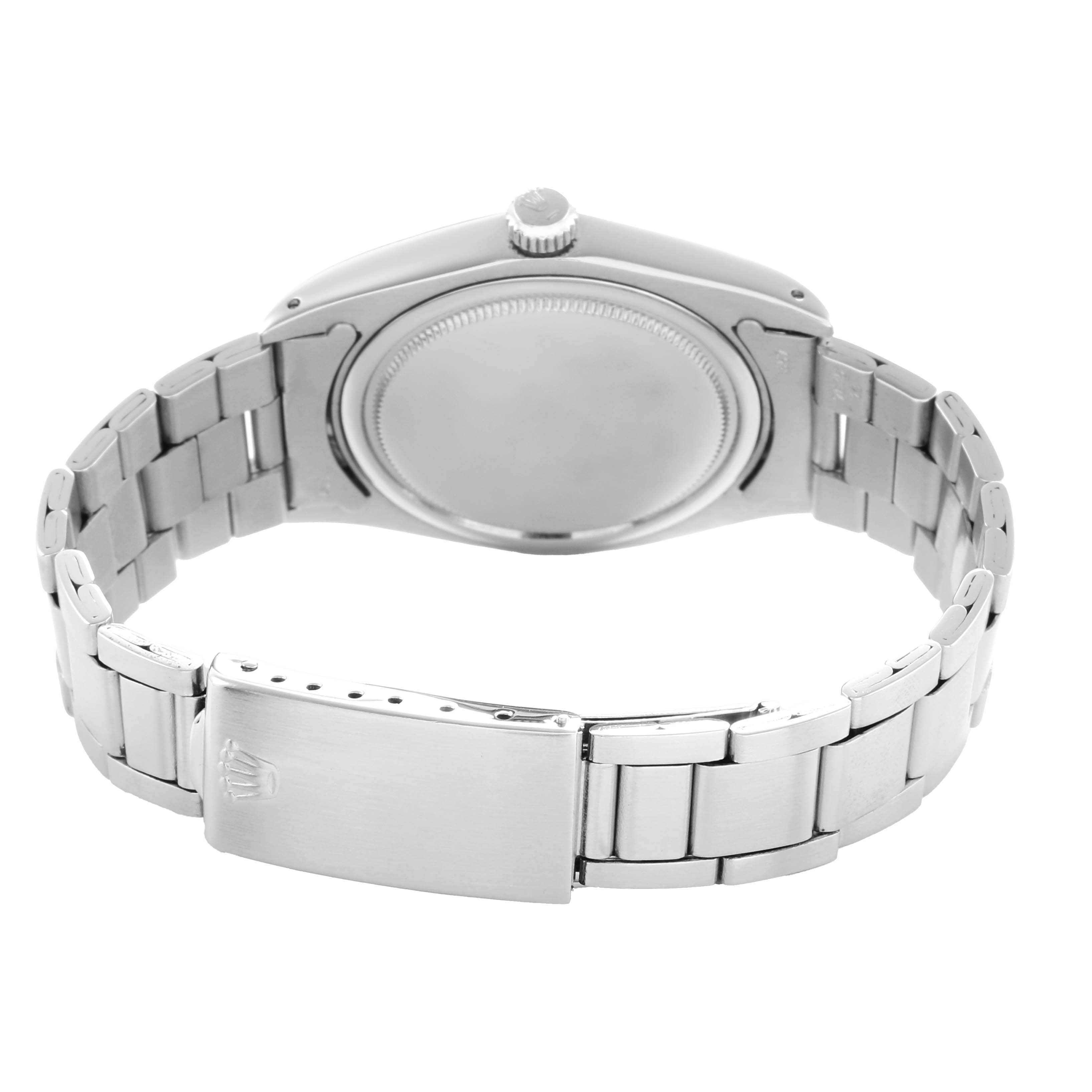 The image shows the back and clasp of the Rolex Vintage Collection 6694 Men
s Stainless Steel Silver Dial watch from a rear angle.