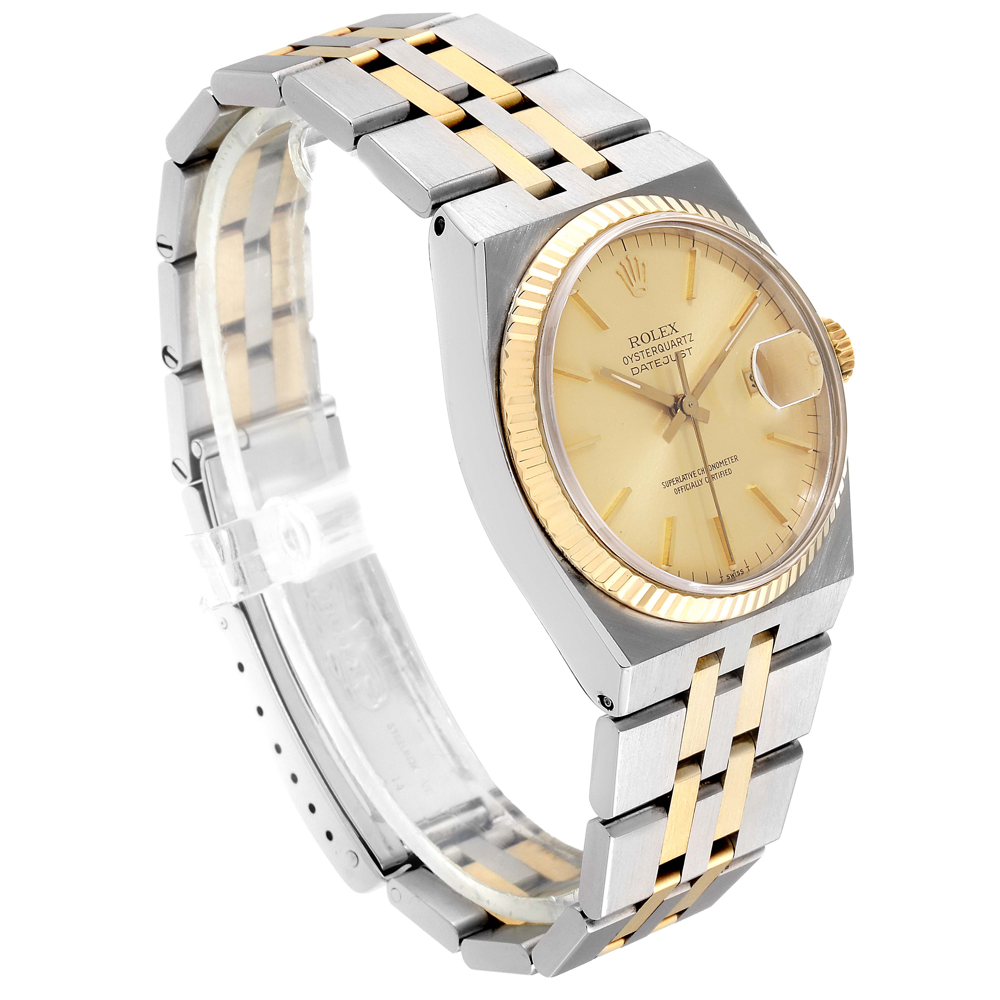 The Rolex Oysterquartz 17013 Men's Steel and Gold (two tone) Champagne Dial 17013 Men's Steel and Gold (two tone) Champagne Dial watch is shown at a three-quarter angle, highlighting its two-tone bracelet, golden dial, and fluted bezel.