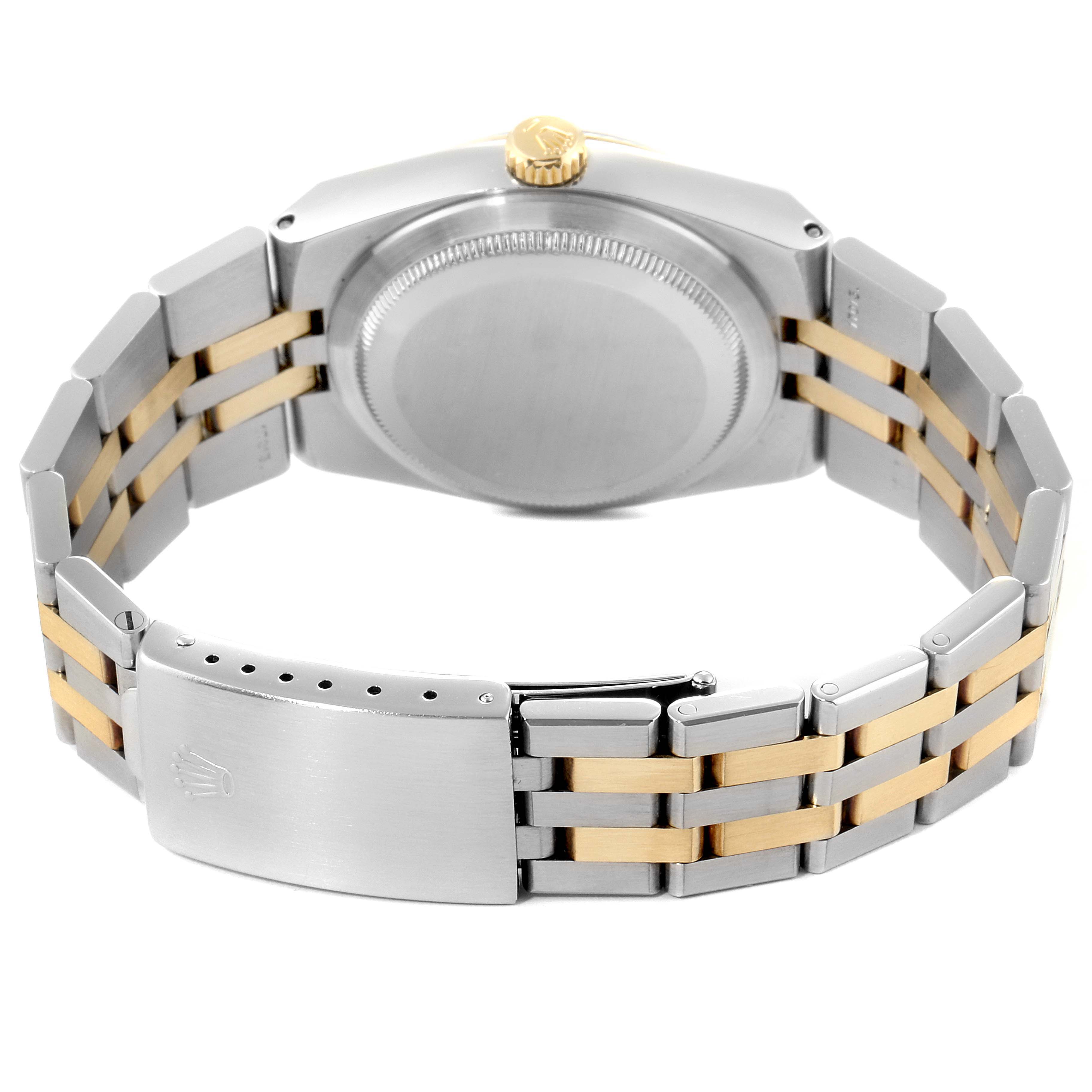 This image shows the back view of a Rolex Oysterquartz 17013 Men's Steel and Gold (two tone) Champagne Dial 17013 Men's Steel and Gold (two tone) Champagne Dial watch, highlighting its case back, crown, and two-tone bracelet.