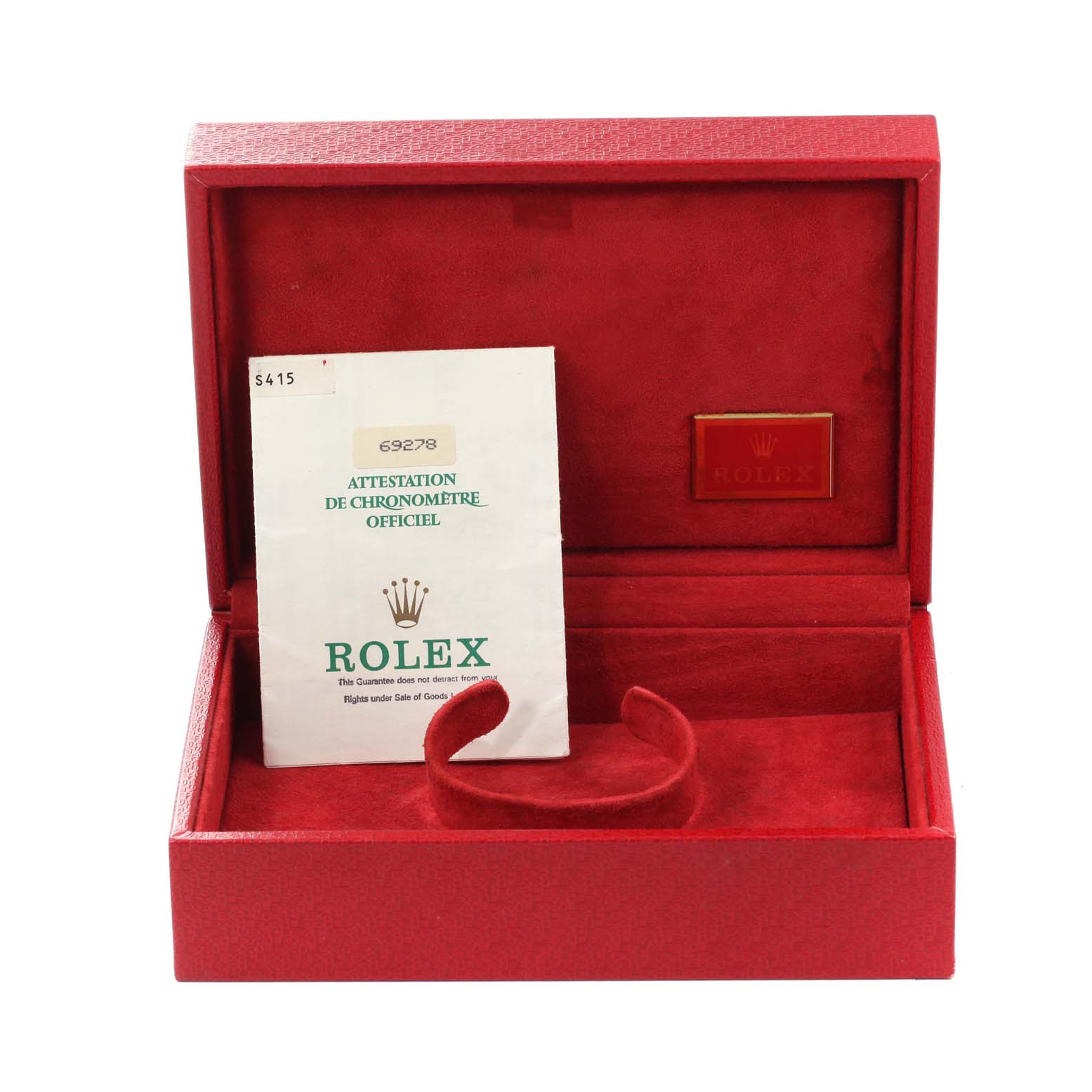 The image shows an open red Rolex watch box with papers and a cushion for the President model.